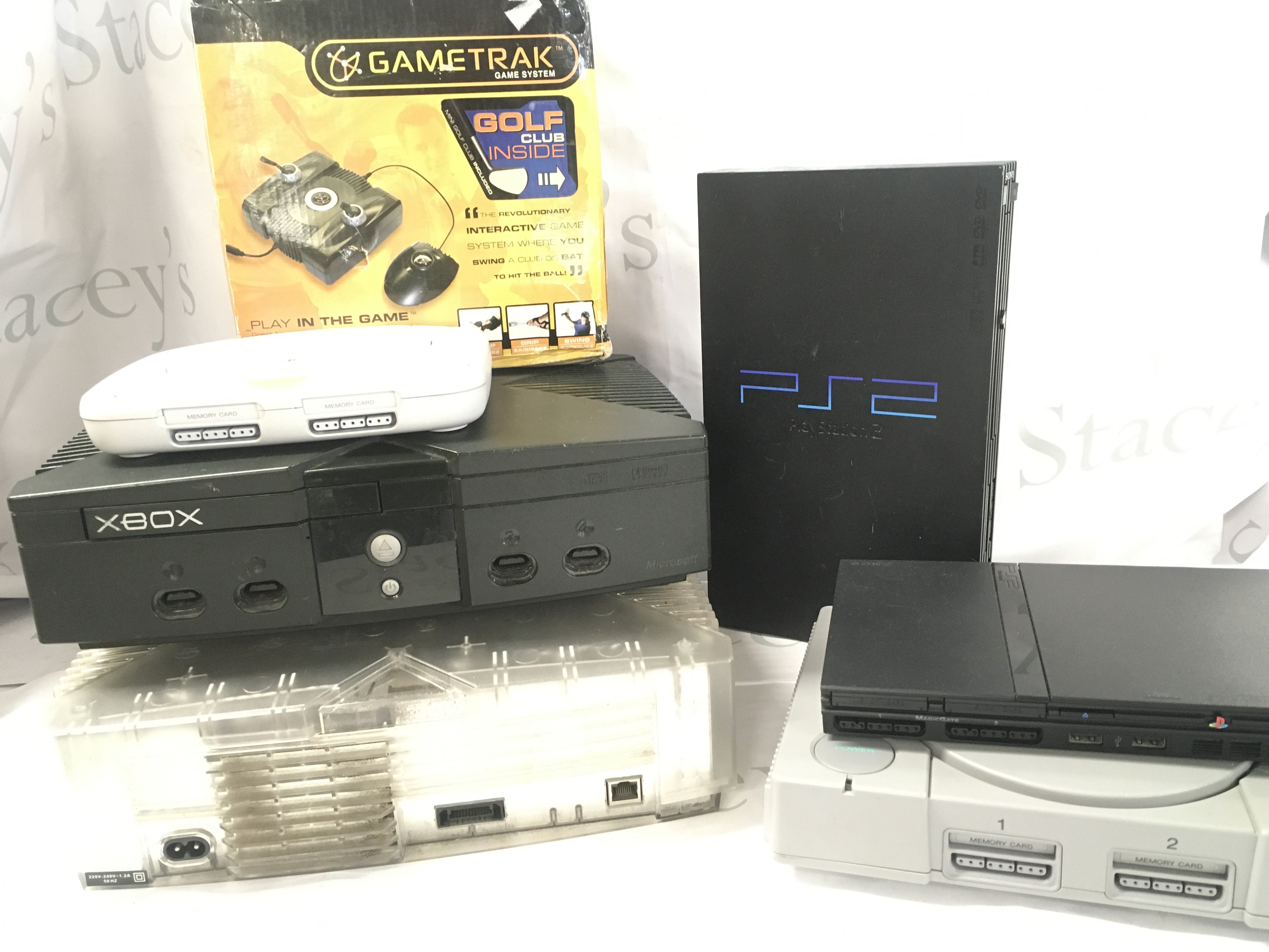 WITHDRAWN A Collection of Games Consoles with Controllers. Leads And Games.