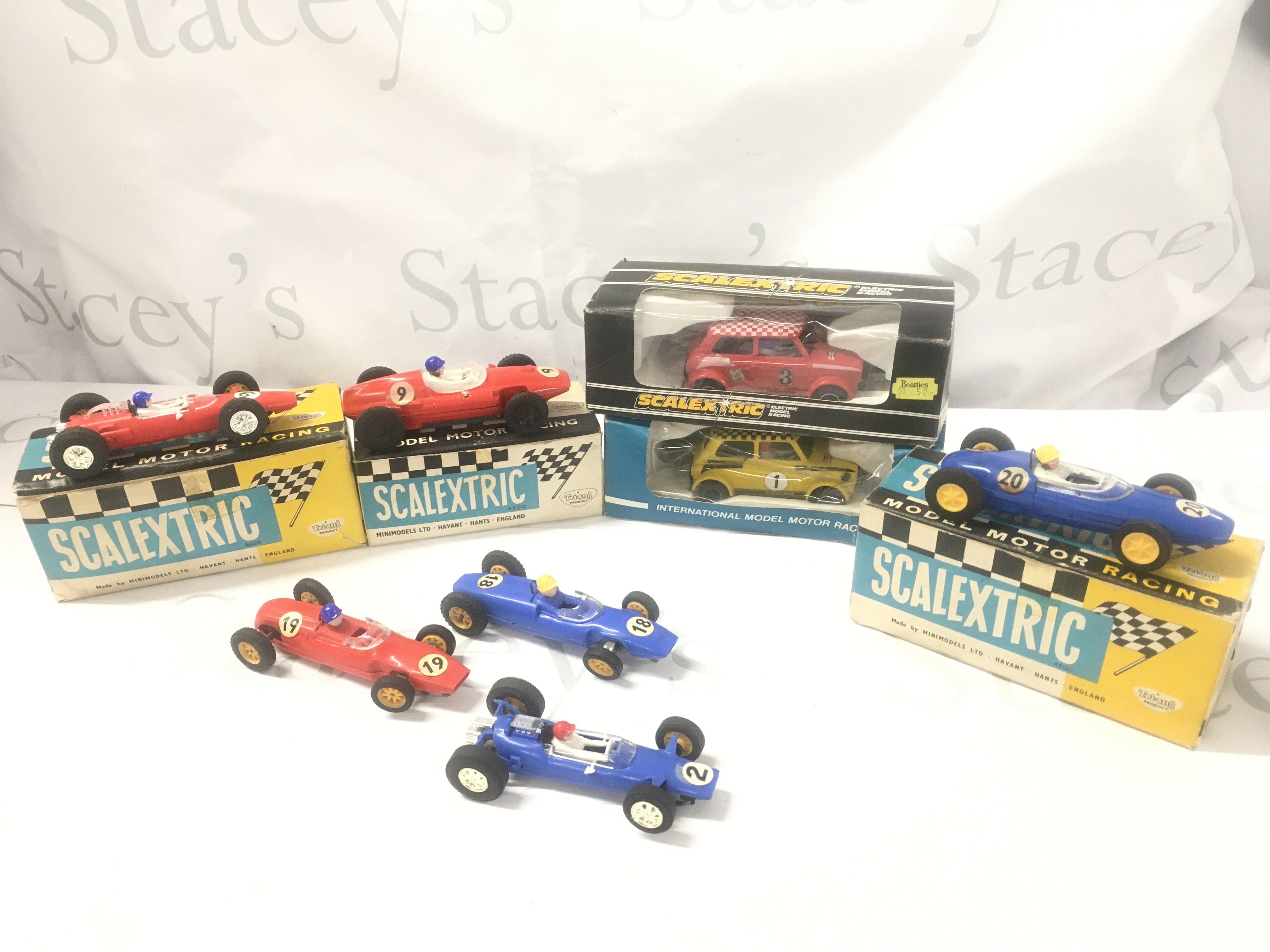 A Collection of Boxed And Loose Scalextric Cars In Various States. No Reserve.