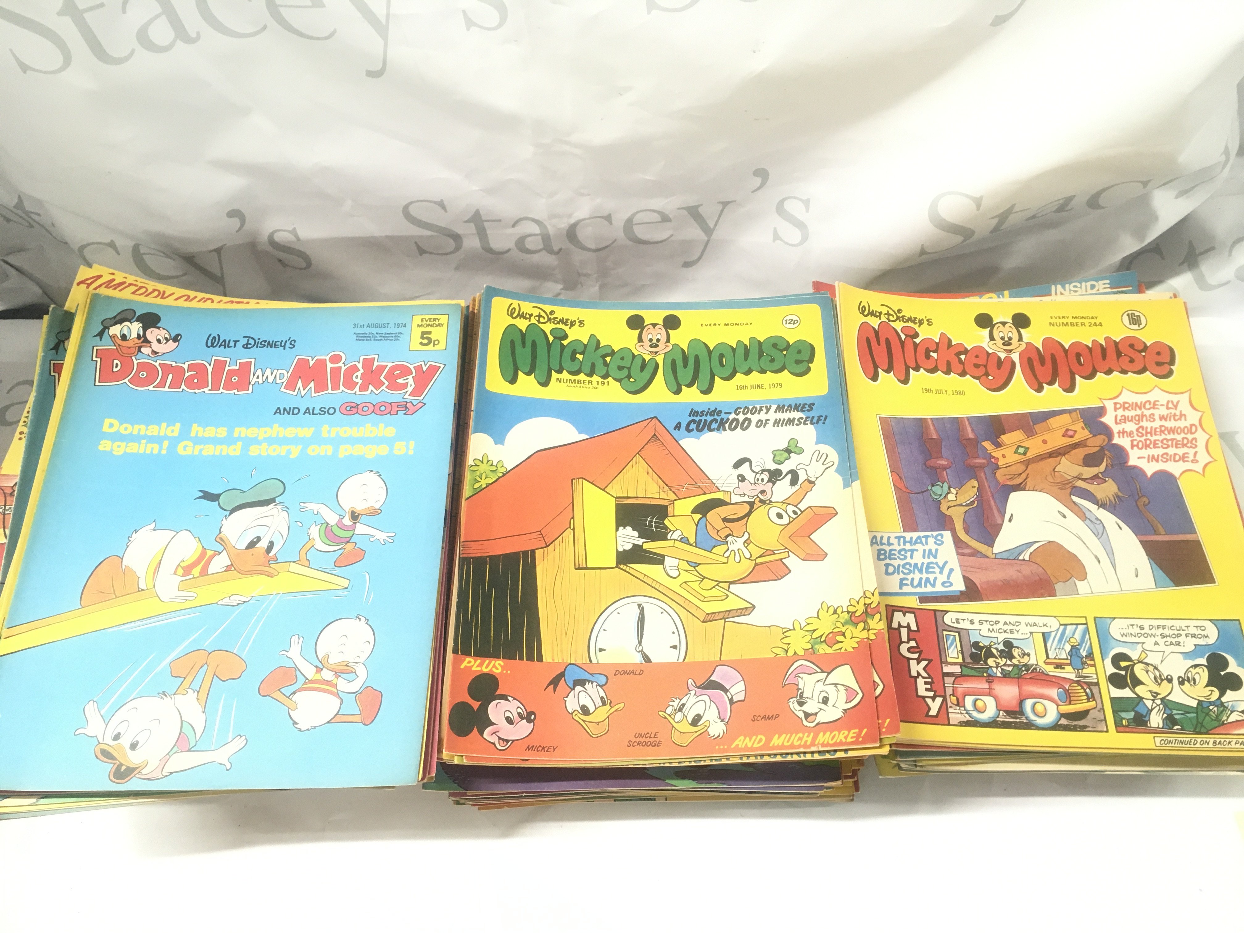 A Box Containing Disney Mickey Mouse Comics mostly From The 1970s And 1980s Approx 200. No Reserve.