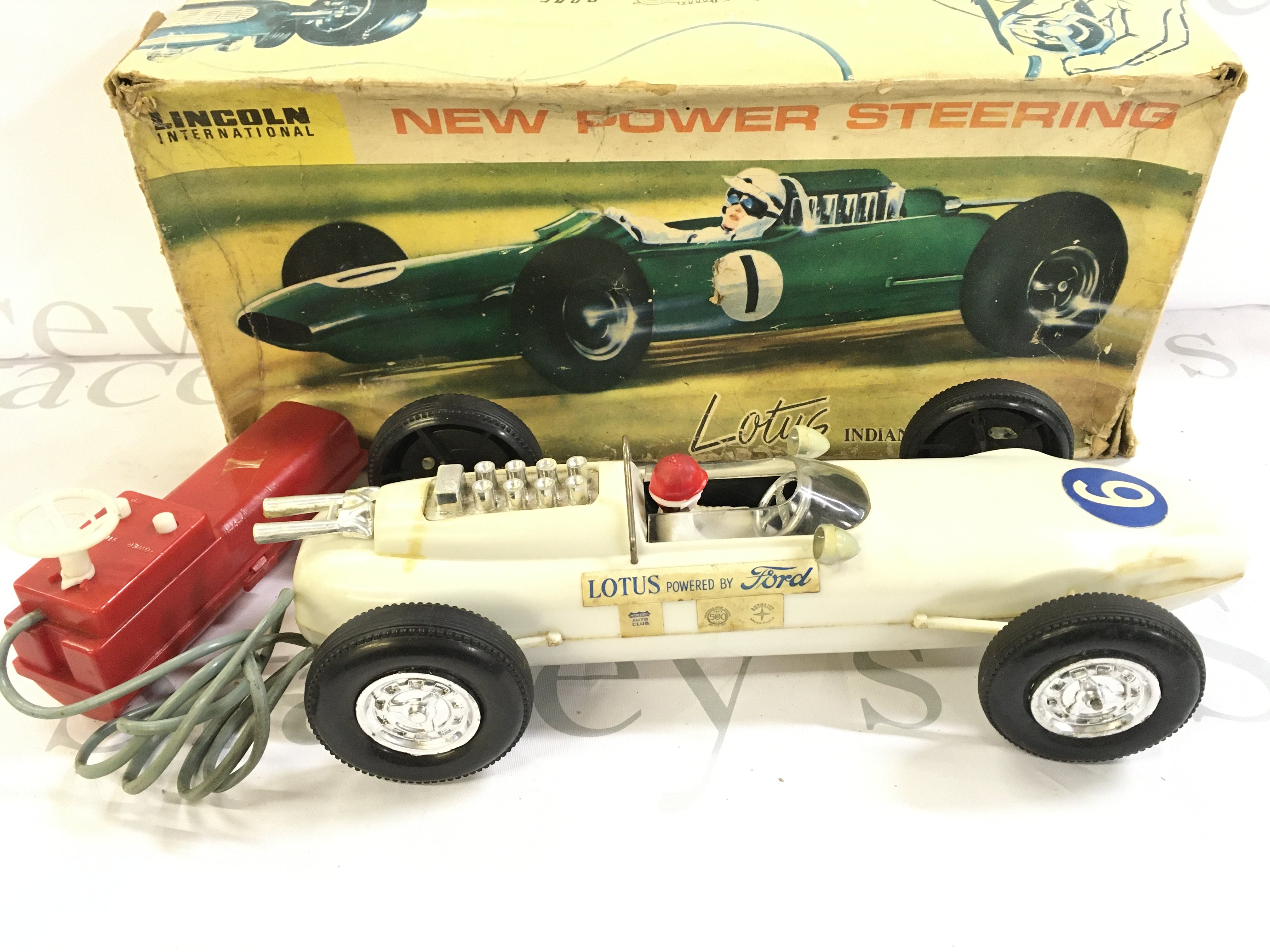 A Boxed Lincoln Imternational Remote Controlled Lotus Indianapolis Racing Car.
