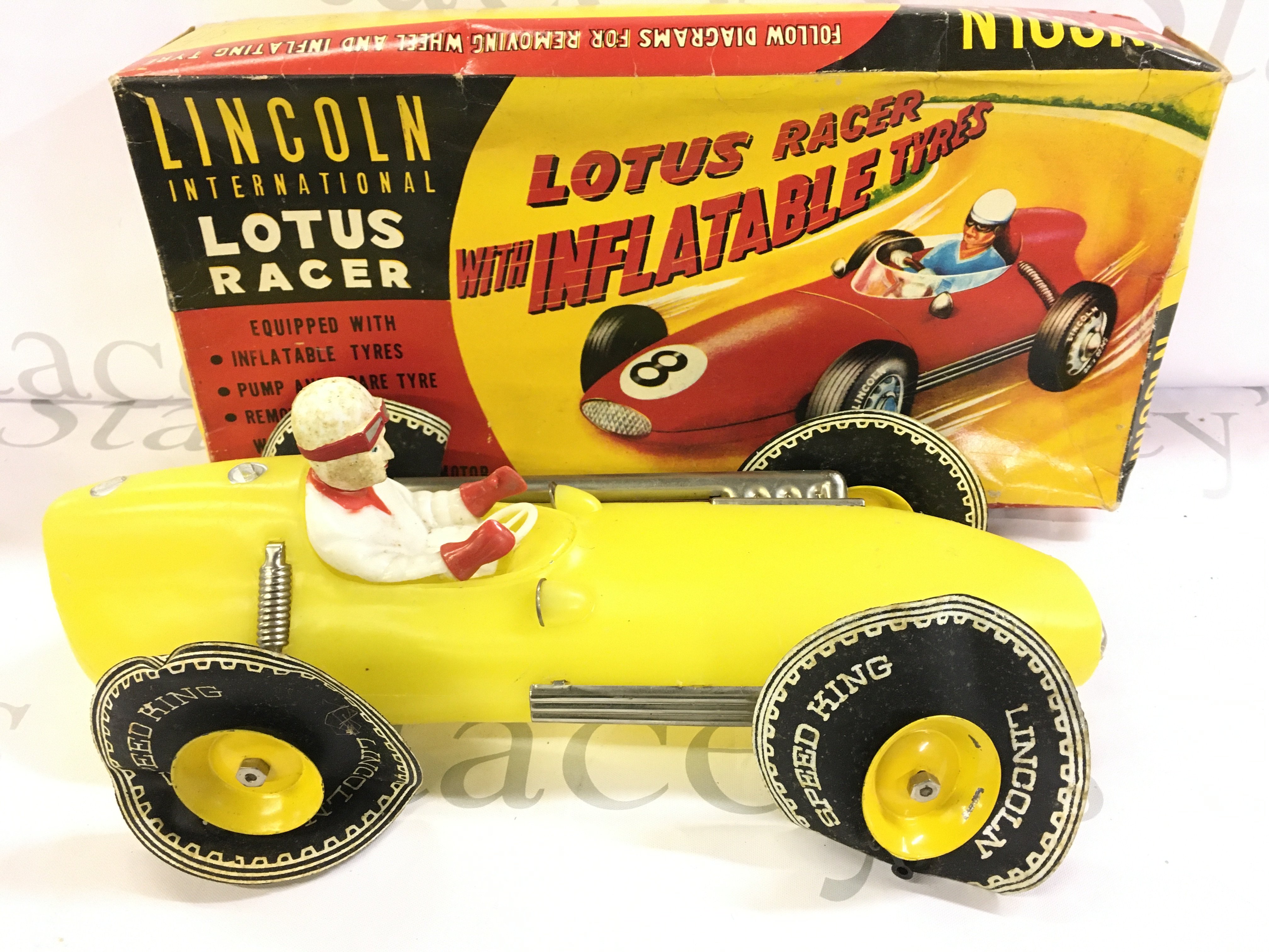 A Boxed Lincoln International Lotus Racer With Inflatable Tyres.