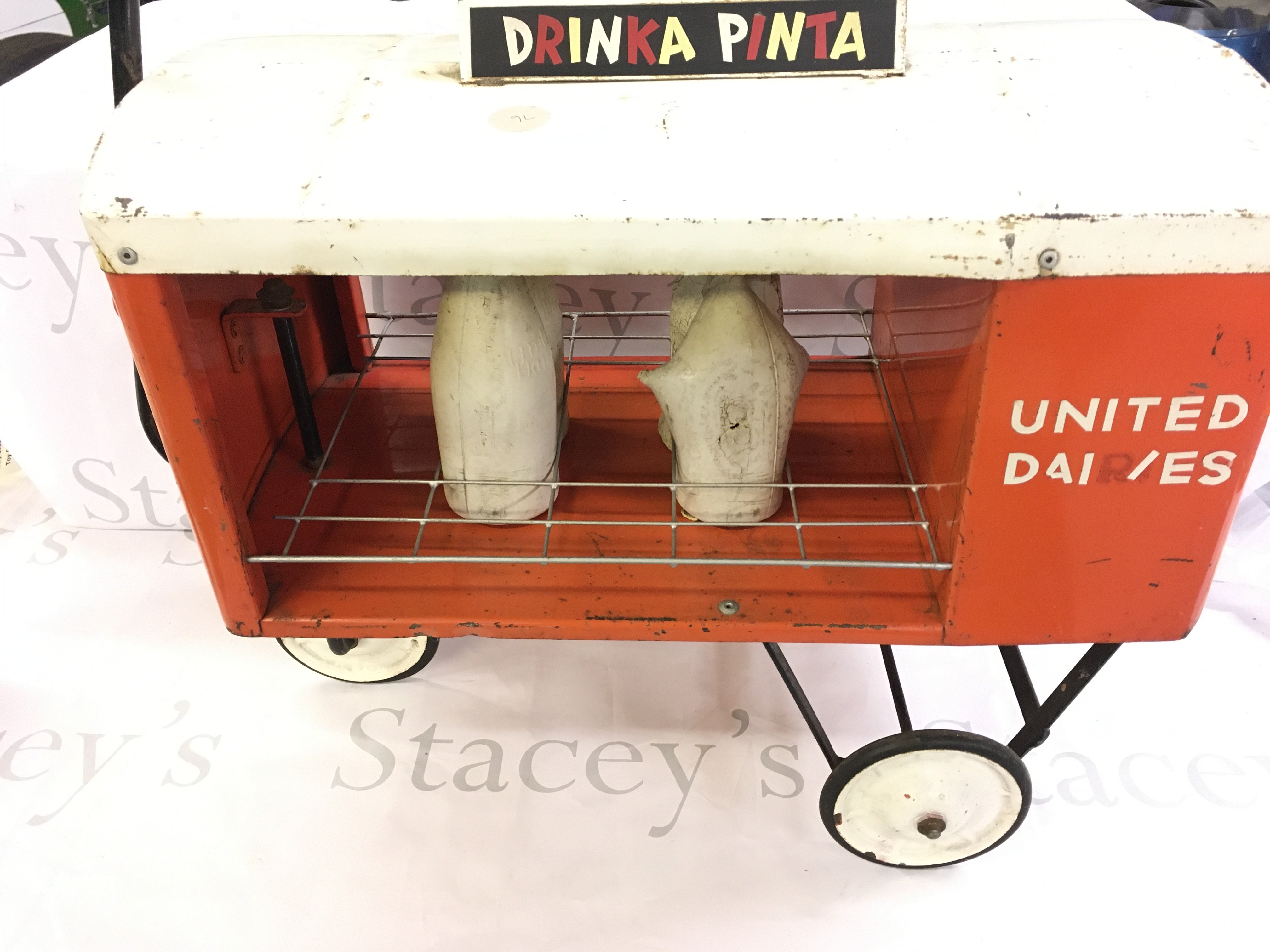 A 1960s Tri-Ang Pull Along Toy Milk Float.