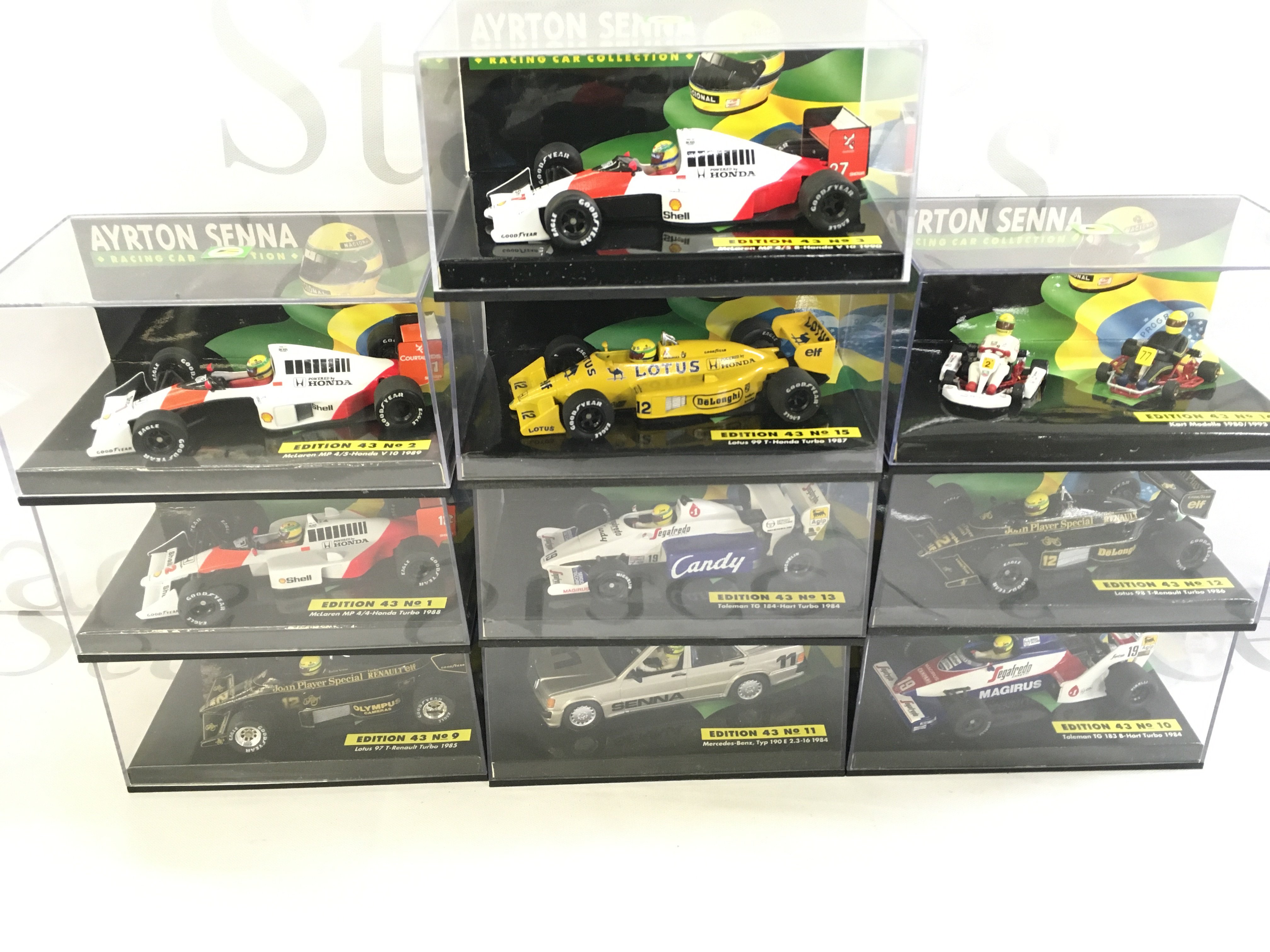 The Complete Set of 18 Boxed Lang/Minichamps The Ayrton Senna Racing Car Collection. 1/43 Scale. With Cardboard Sleeves And Certificate.