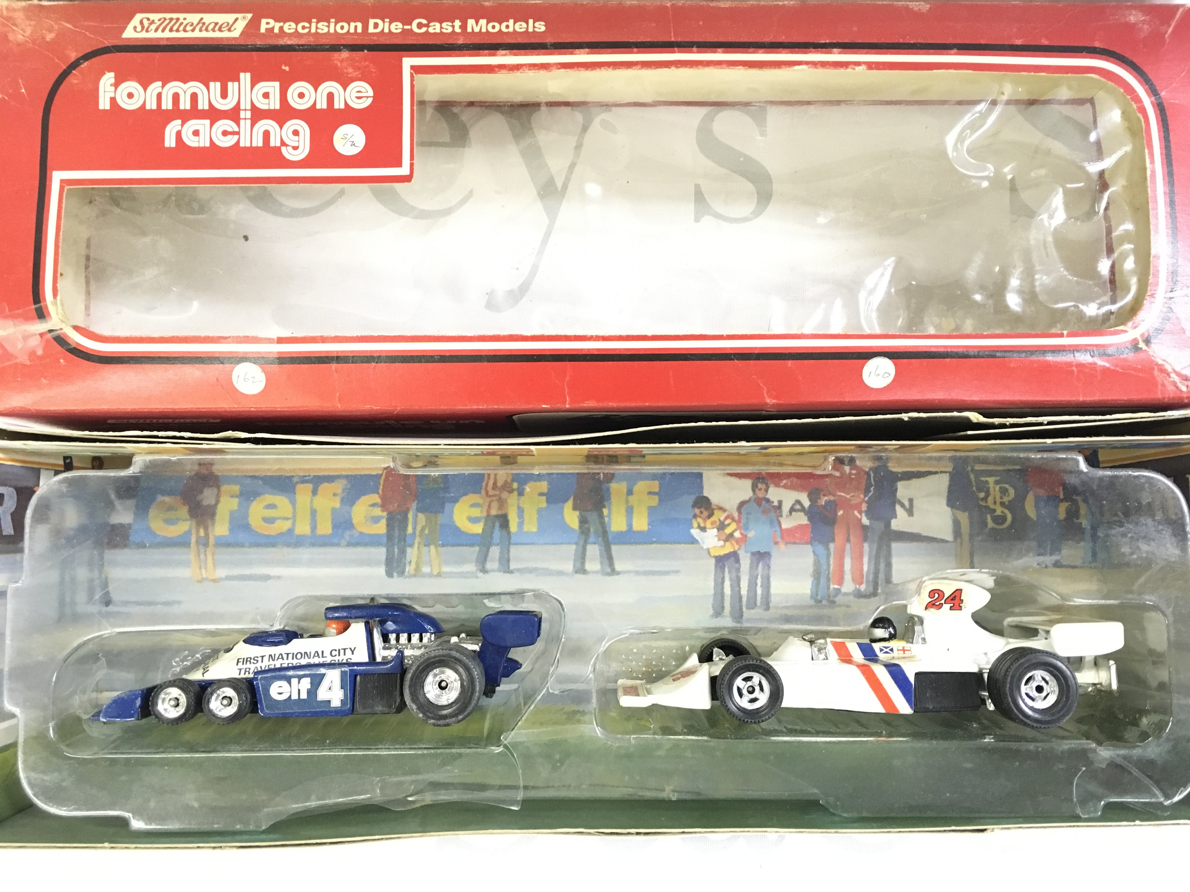 A Boxed St. Michael Formula 1 Racing Set. And Elf-Tyrell Project 34 With Hasketh 308.