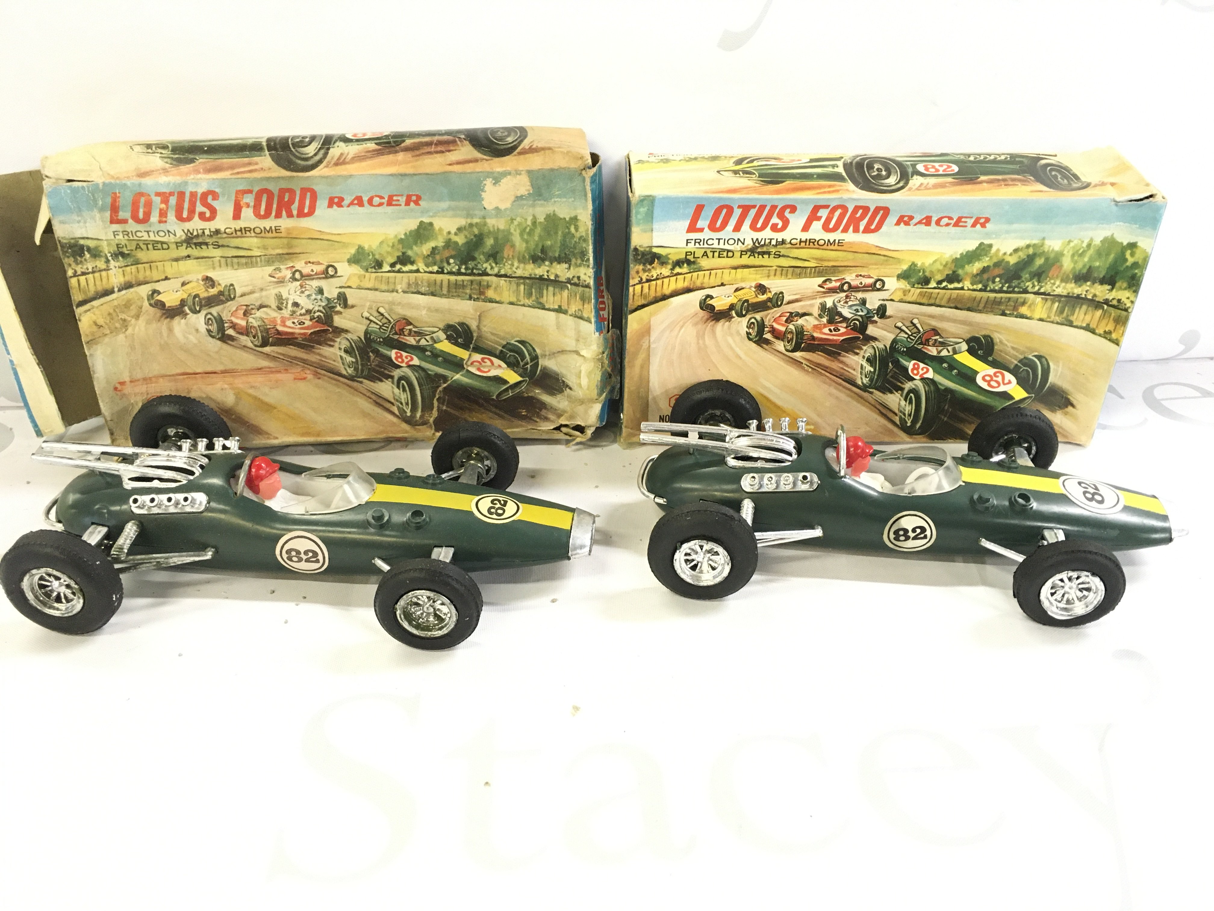 2 X Boxed Lotus Ford Friction Power Cars.