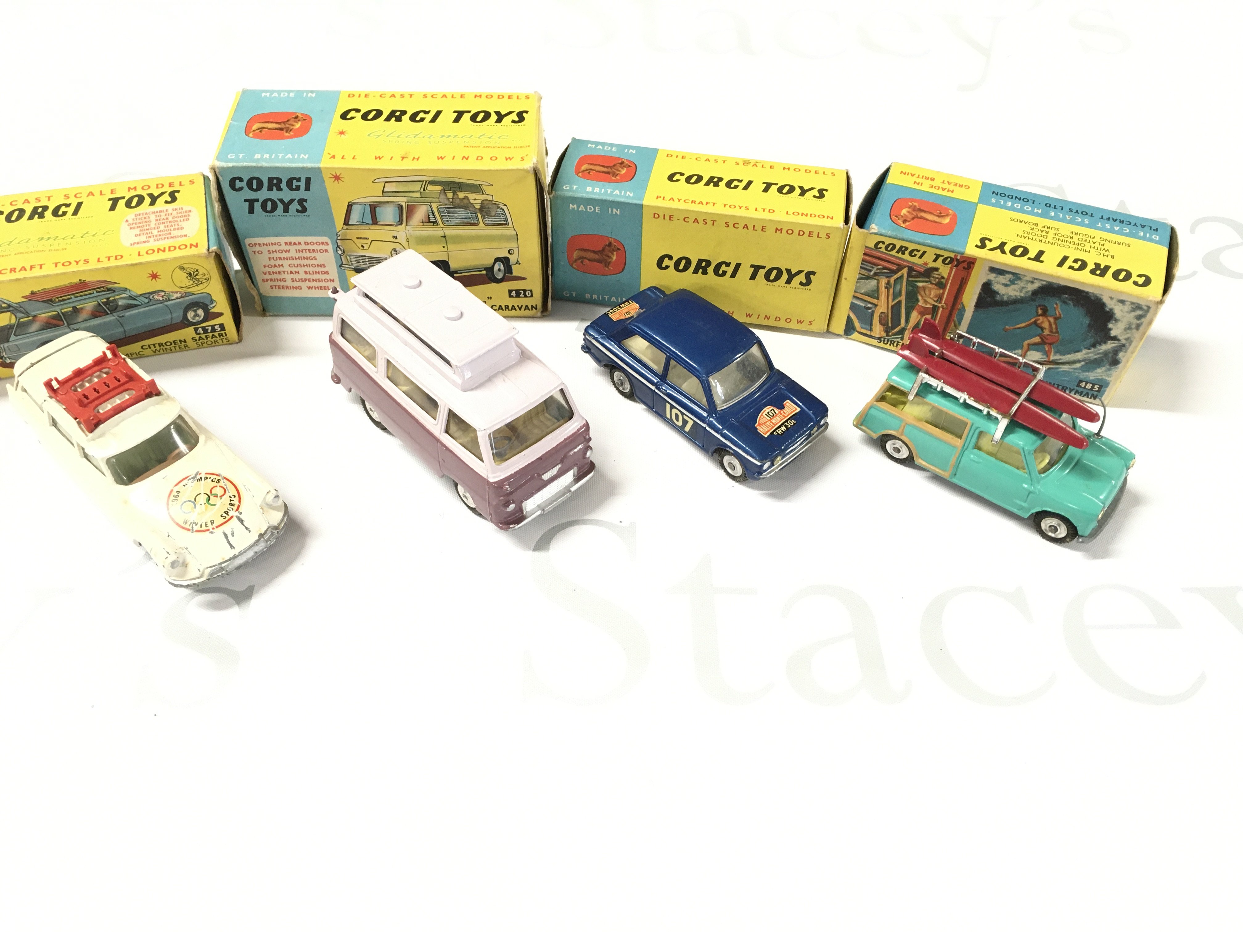 4 X Boxed Corgi Vehicles. A Citron Safari #475. A Ford Thames Caravan #426. A Hillman Imp #328. And A B.M.C. Mini Countryman #485.