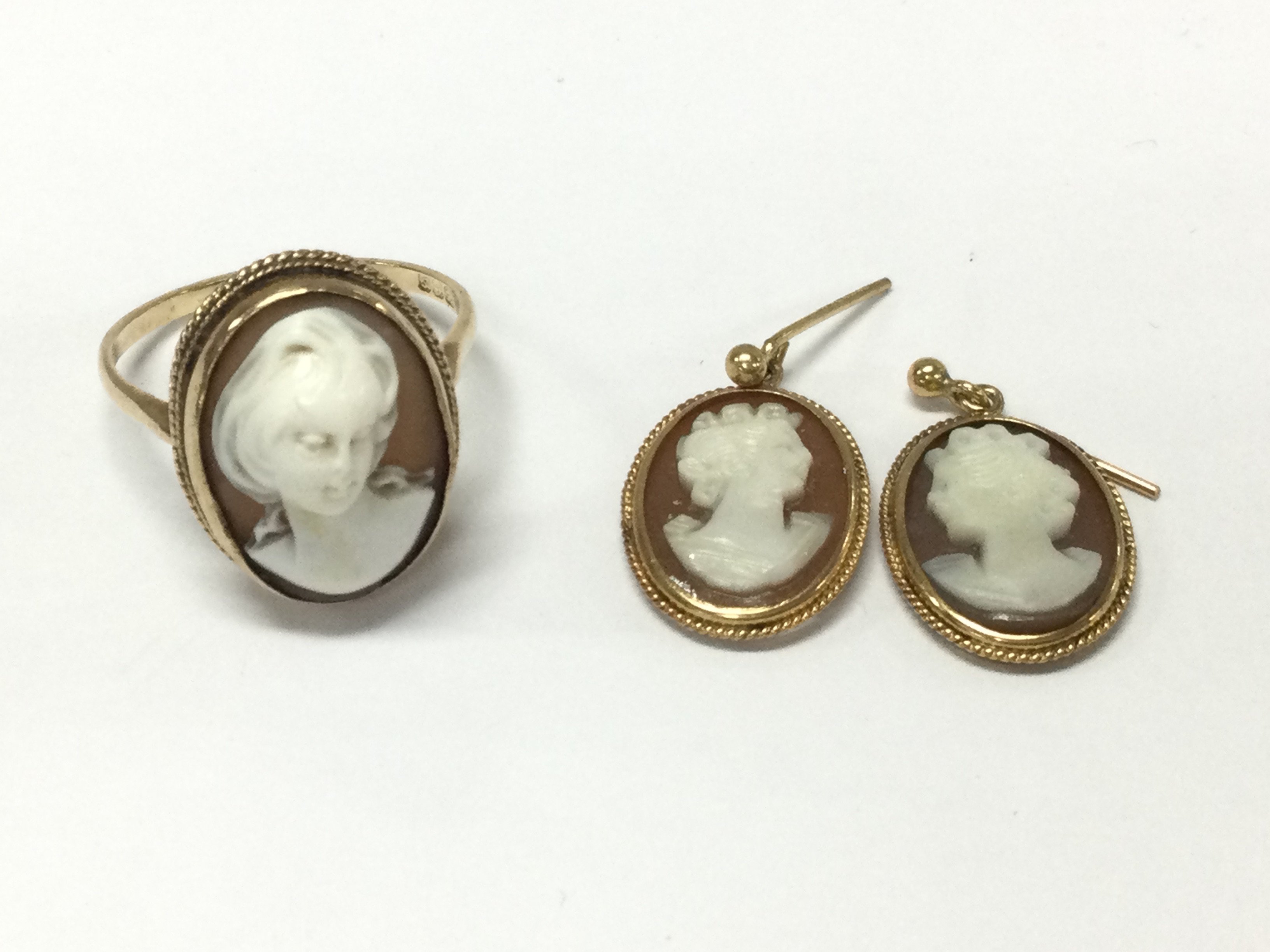 A 9ct gold cameo ring and pair of earrings. Total approx 6.55g
