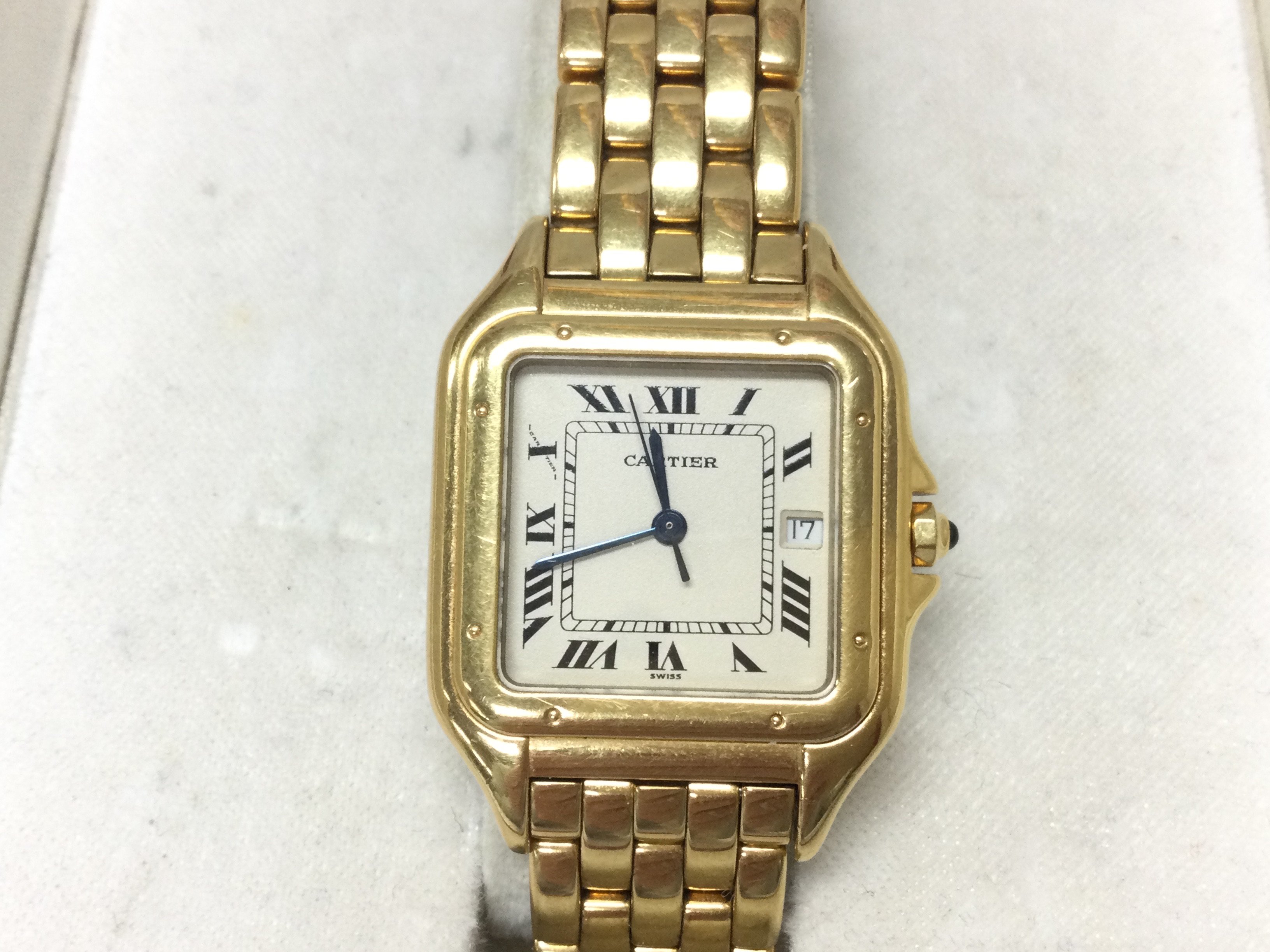 An 18ct gold Cartier Panthere watch. Quartz movement and seen working. Comes with box and additional link. Approximately 116g
