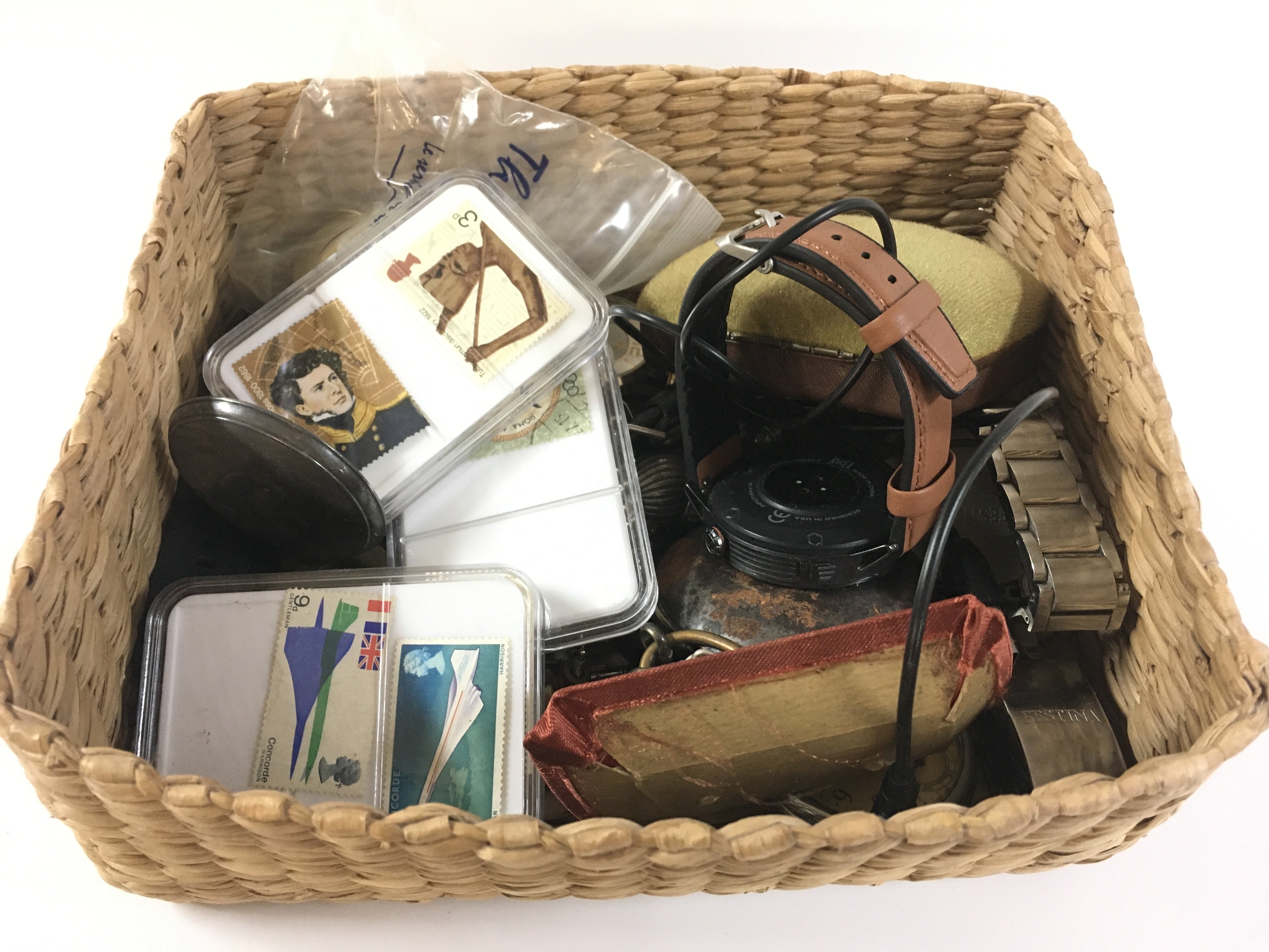 A box of mixed watches including some pocket watches and other oddments.