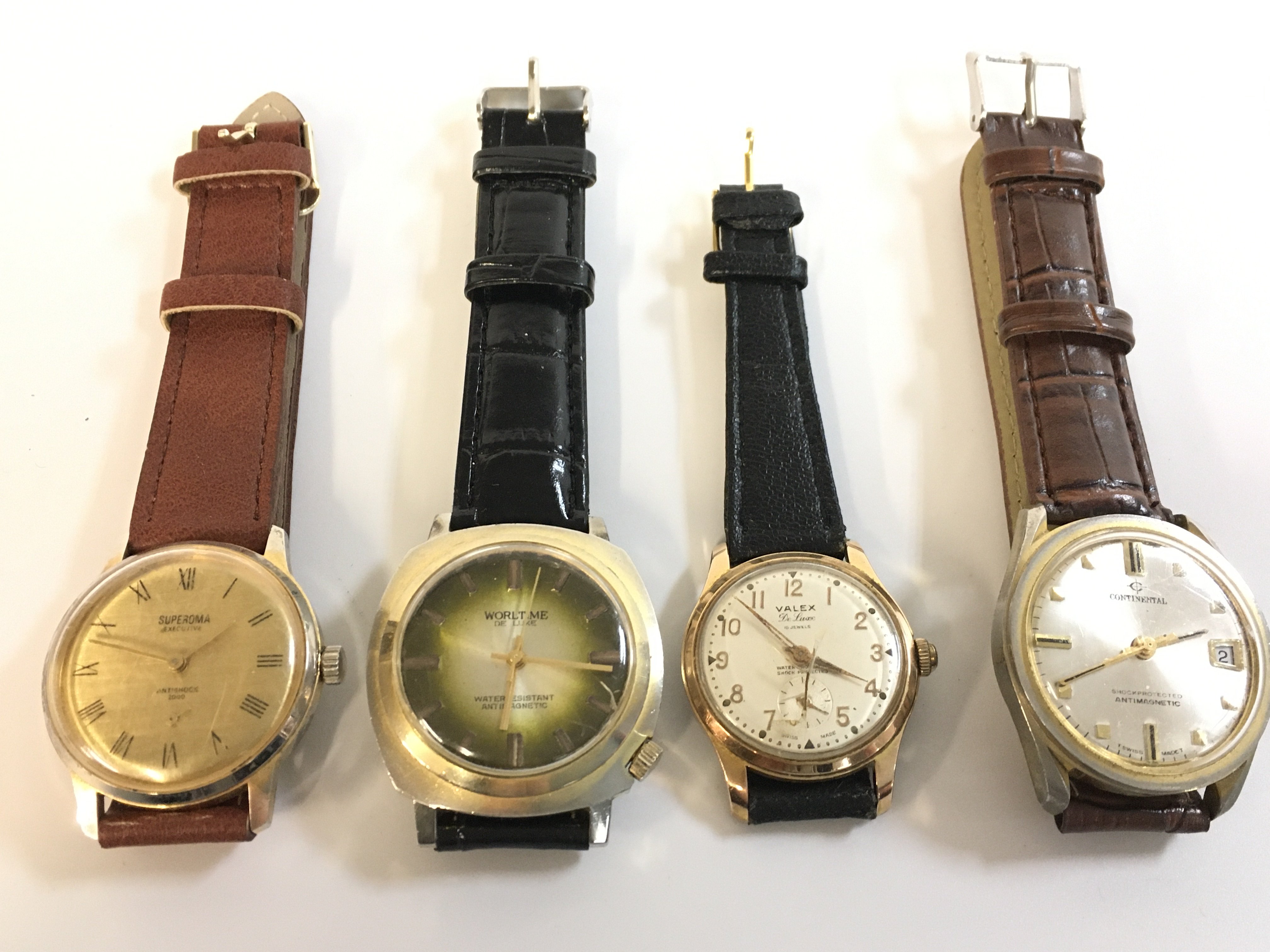 Four vintage gents watches - Continetal, Valex, Worltime and Supernova . Postage category B