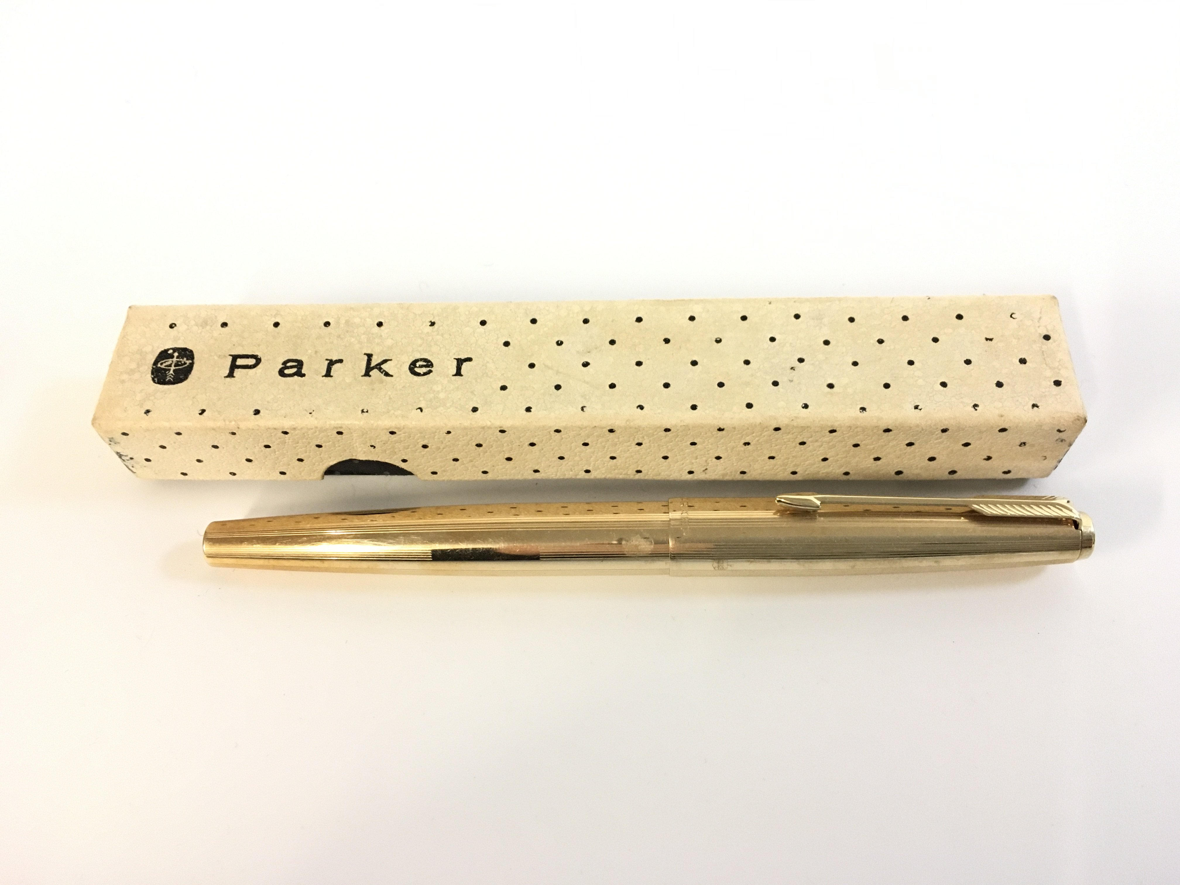 A boxed Parker 61 1/12th rolled gold pen with a 14ct Nib. Postage category A