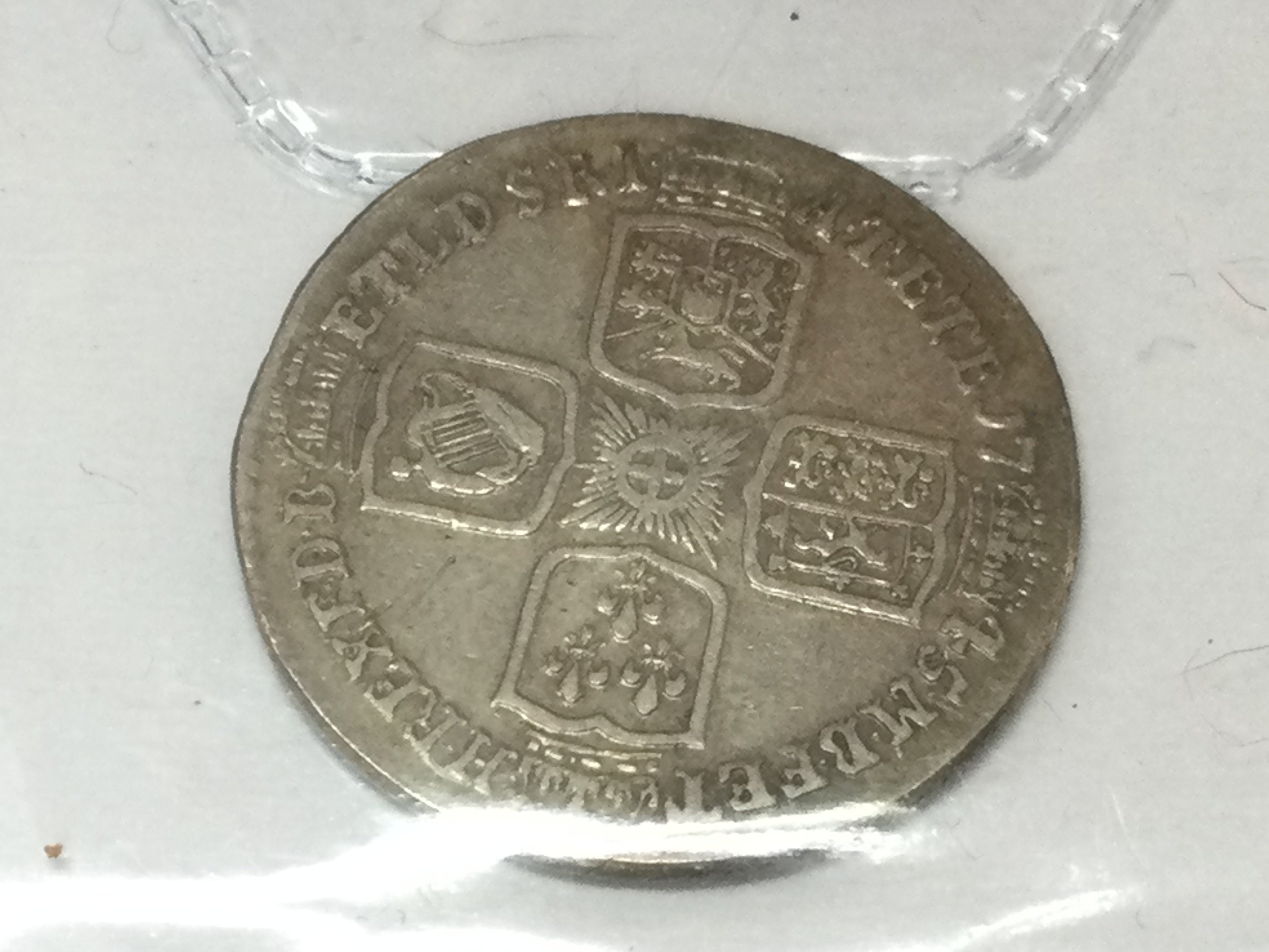 A 1745 GII shilling. Postage A