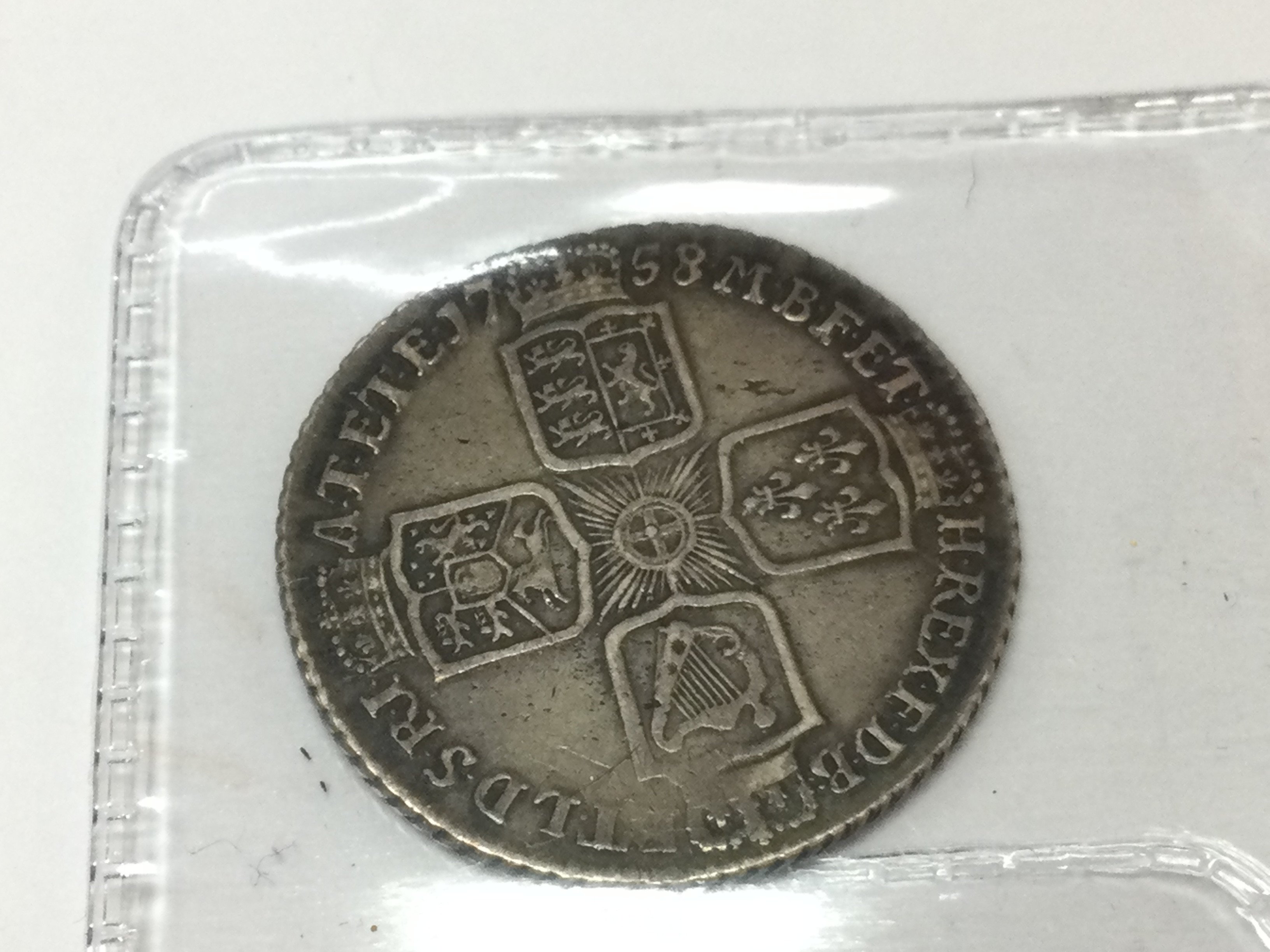 A 1758 GII shilling. Postage A