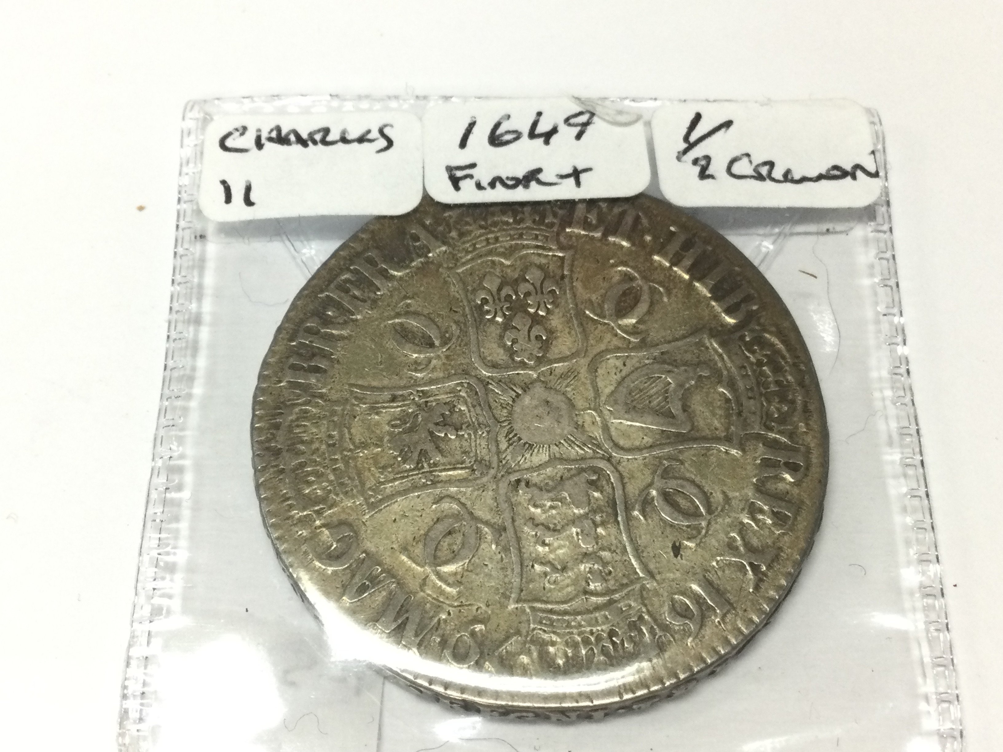A 1679 Charles II half crown Raised letters edge. Postage A