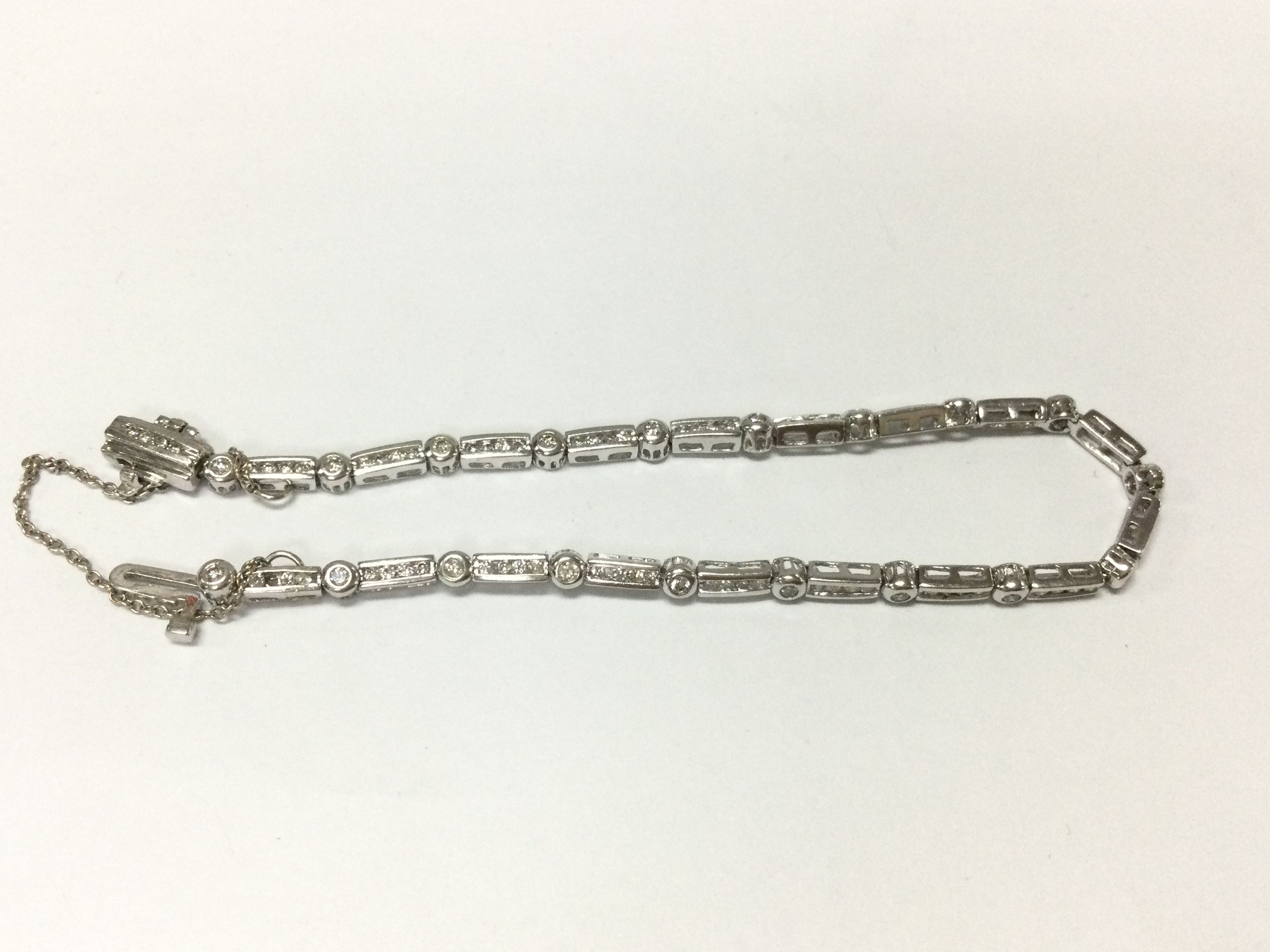 An 18ct white gold bracelet set with diamonds. 7.50g