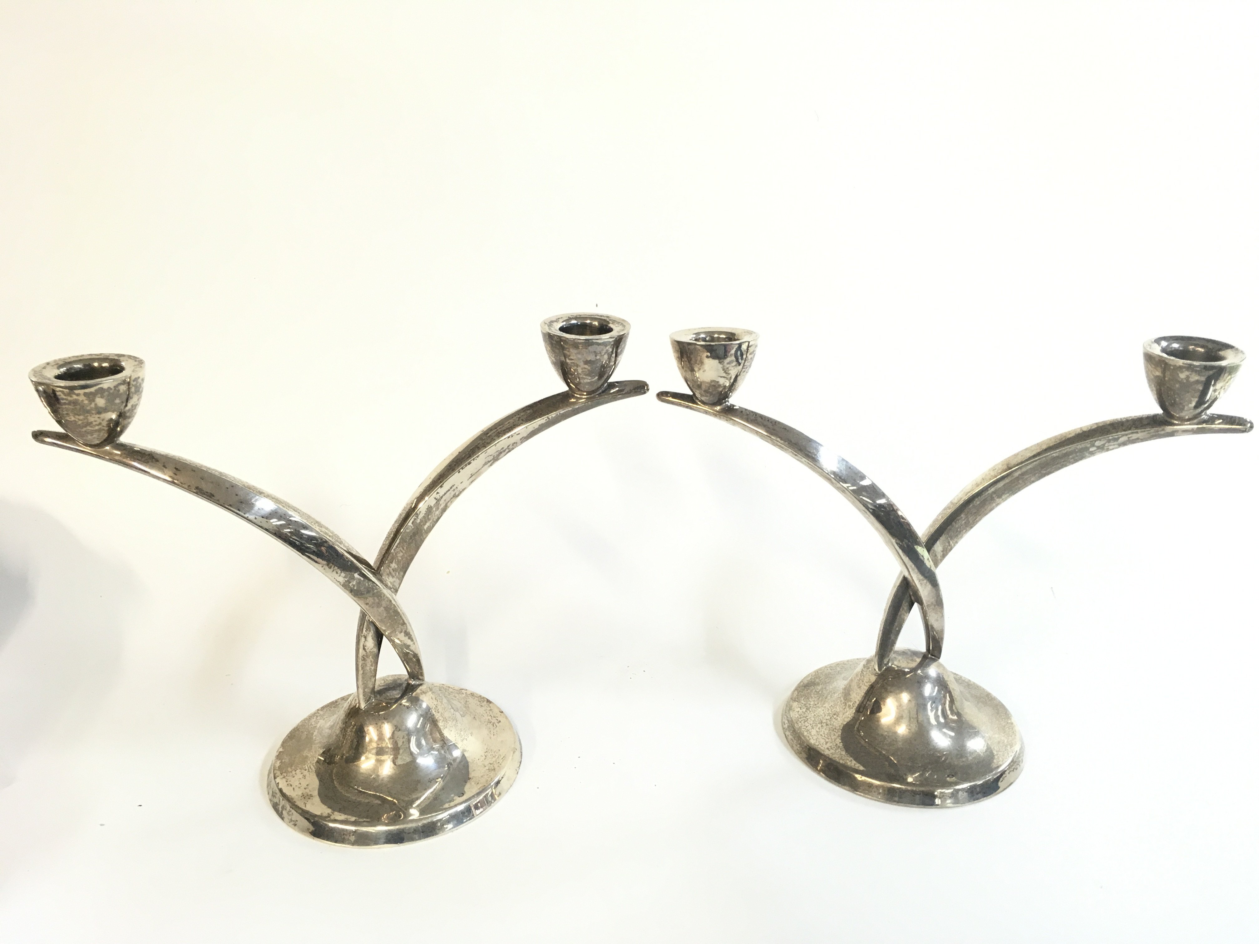 Art Deco silver candlesticks with two branches, 19cm tall. Postage category B