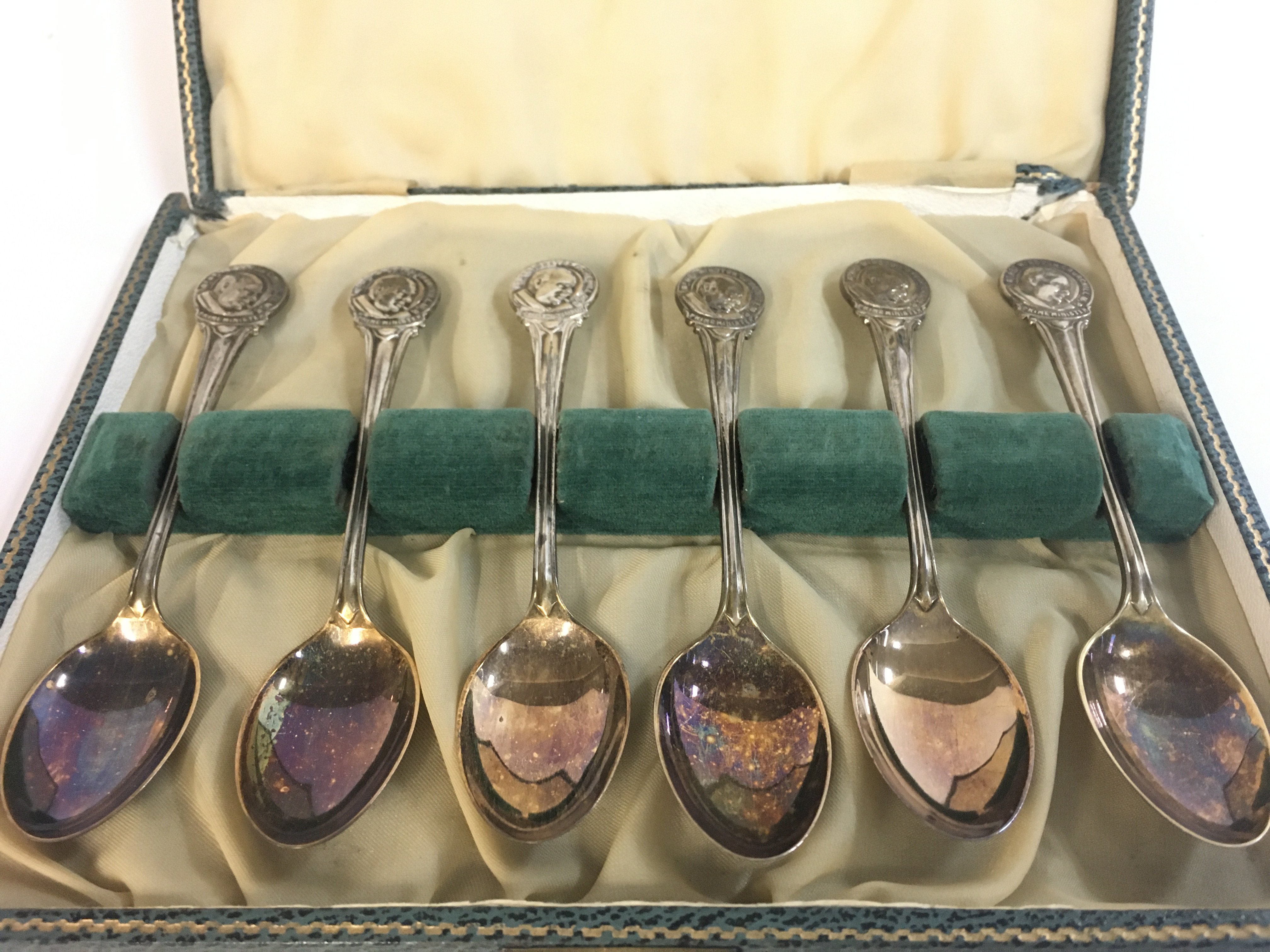A cased set of spoons