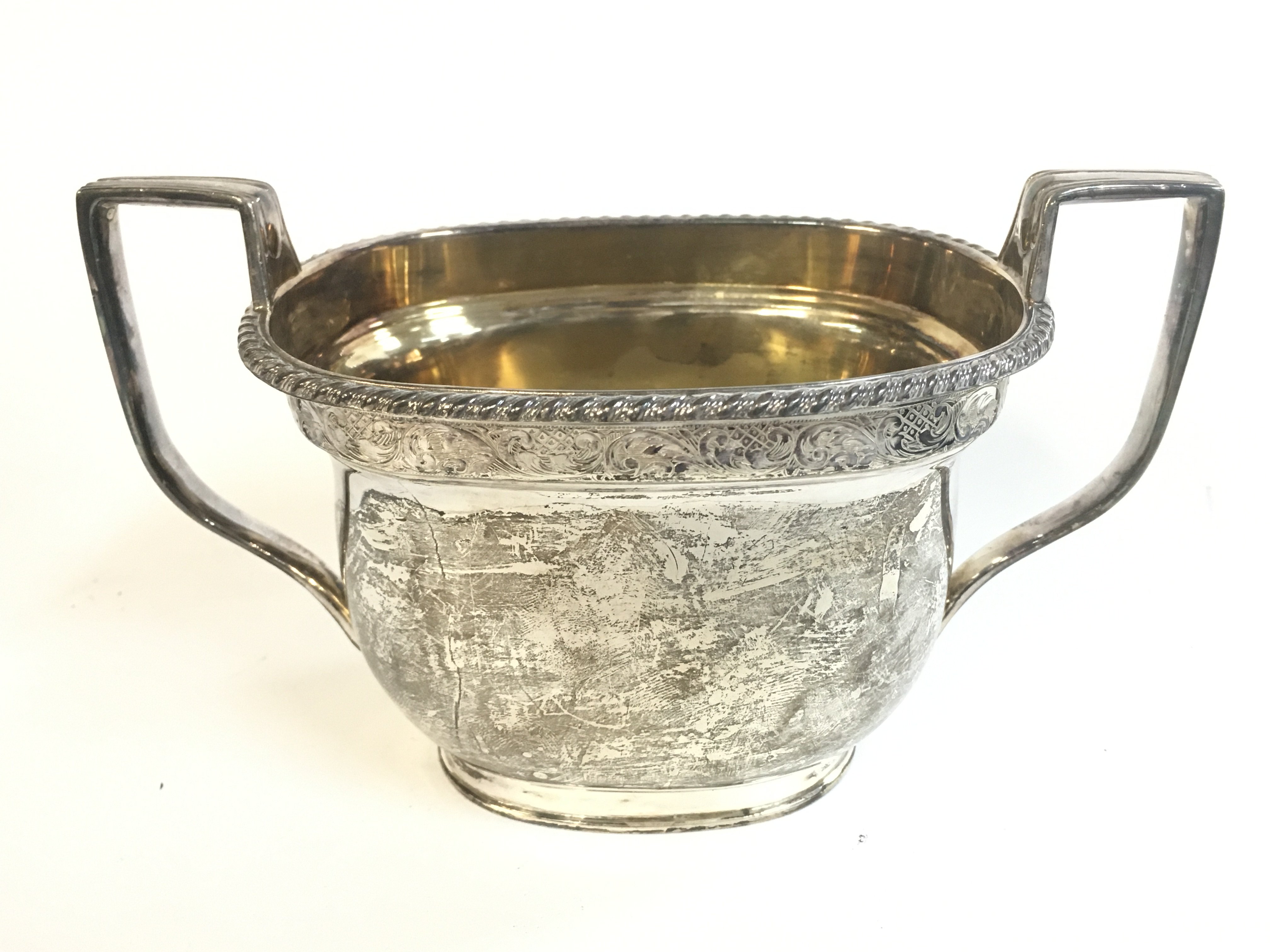 A silver hallmarked sugar bowl. 8cm tall,16.5cm wide approximately. Postage category B