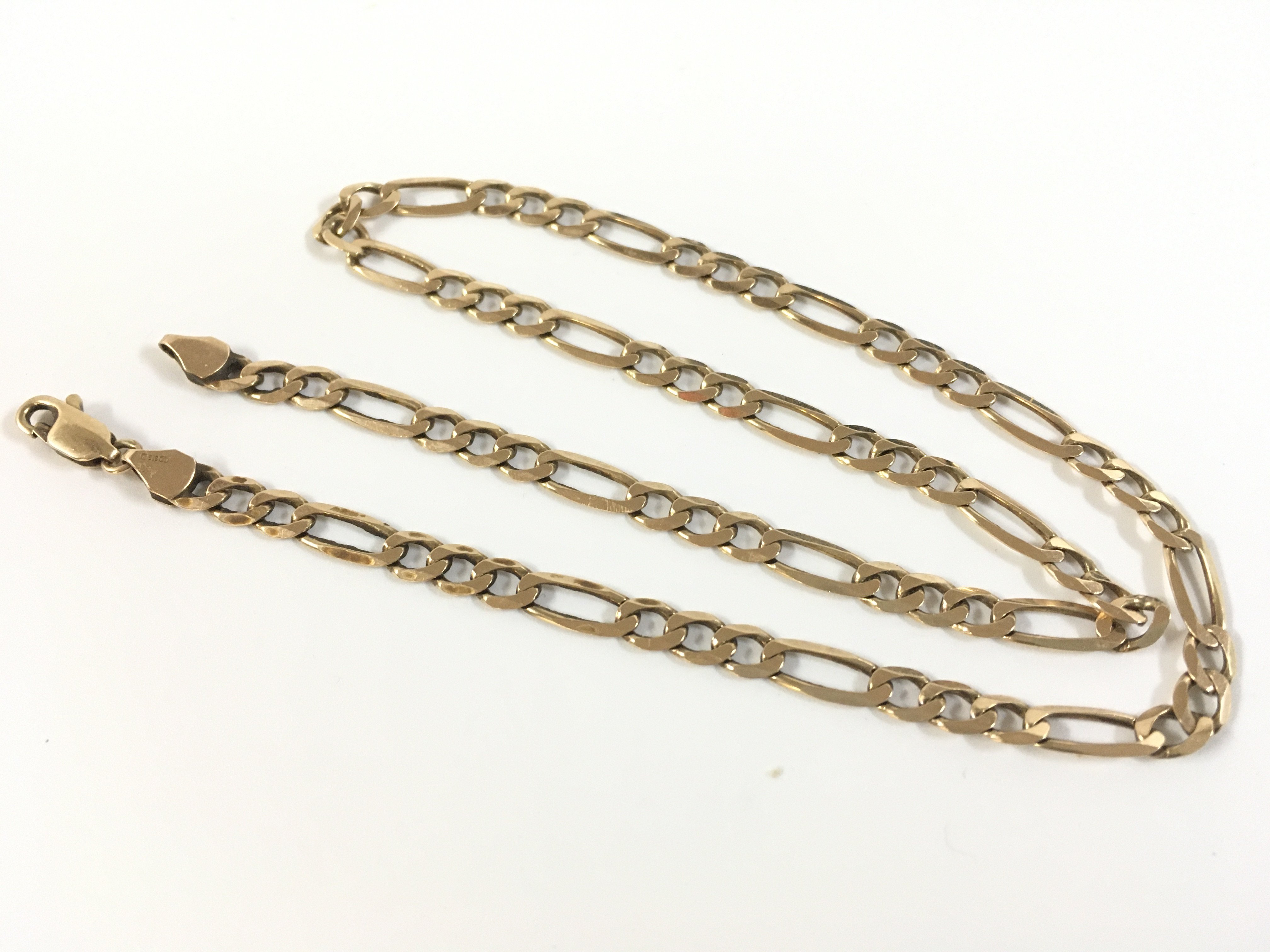 A 9ct gold Figaro chain approximately 16&#2013266057۝ long, Approx weight 10.76 grams.