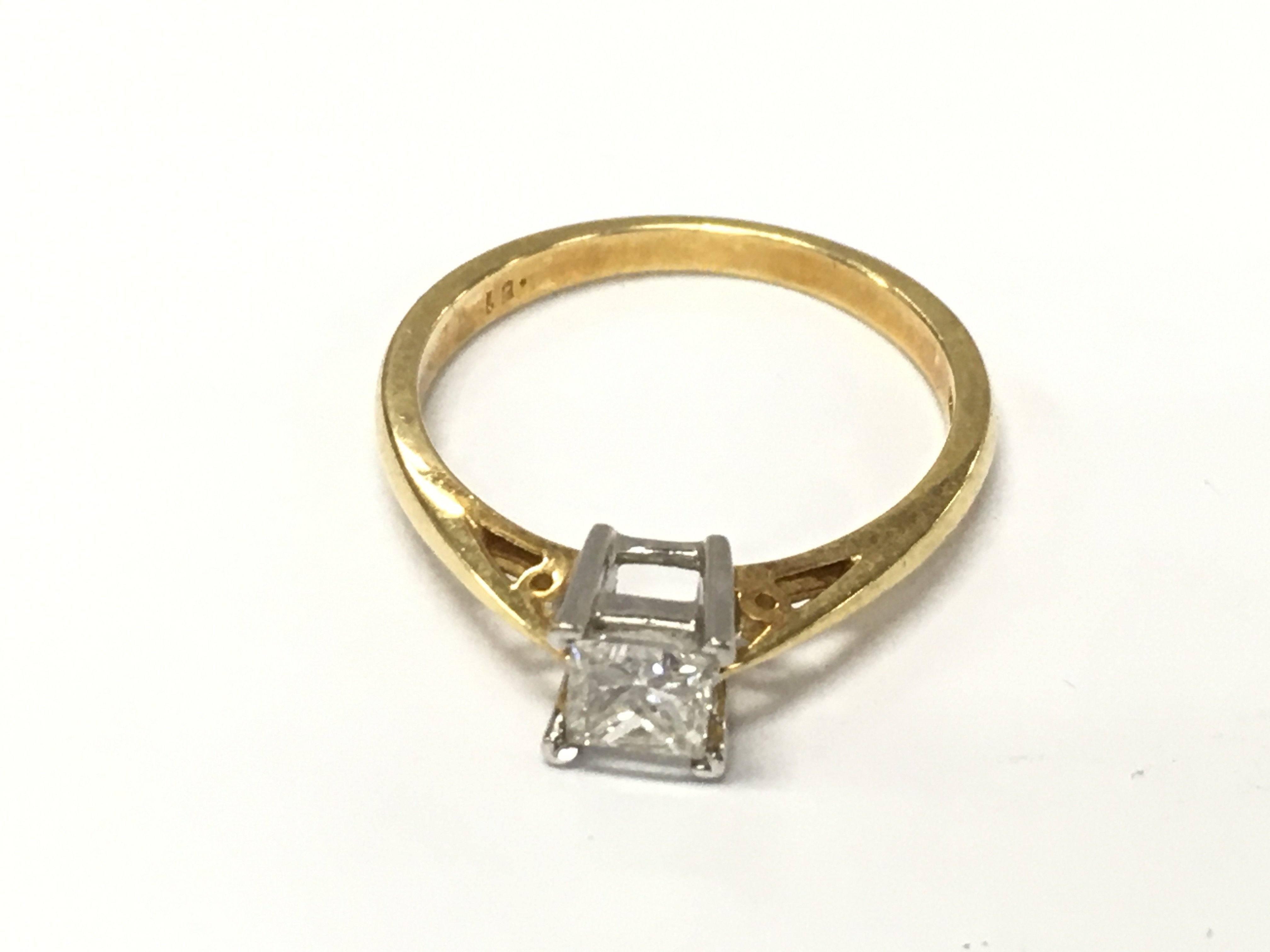 An 18ct gold diamond solitaire ring approximately 0.50ct and size N 2.6g