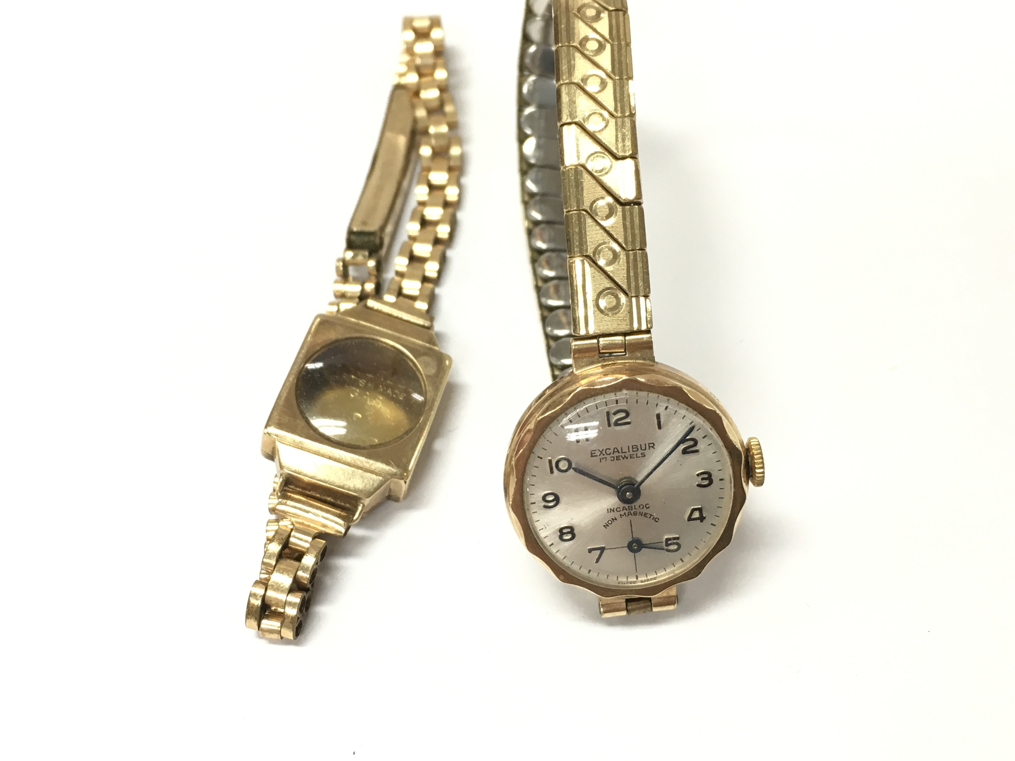 Two ladies 9ct gold cases watches. One has no movement or dial. Total 27.12g