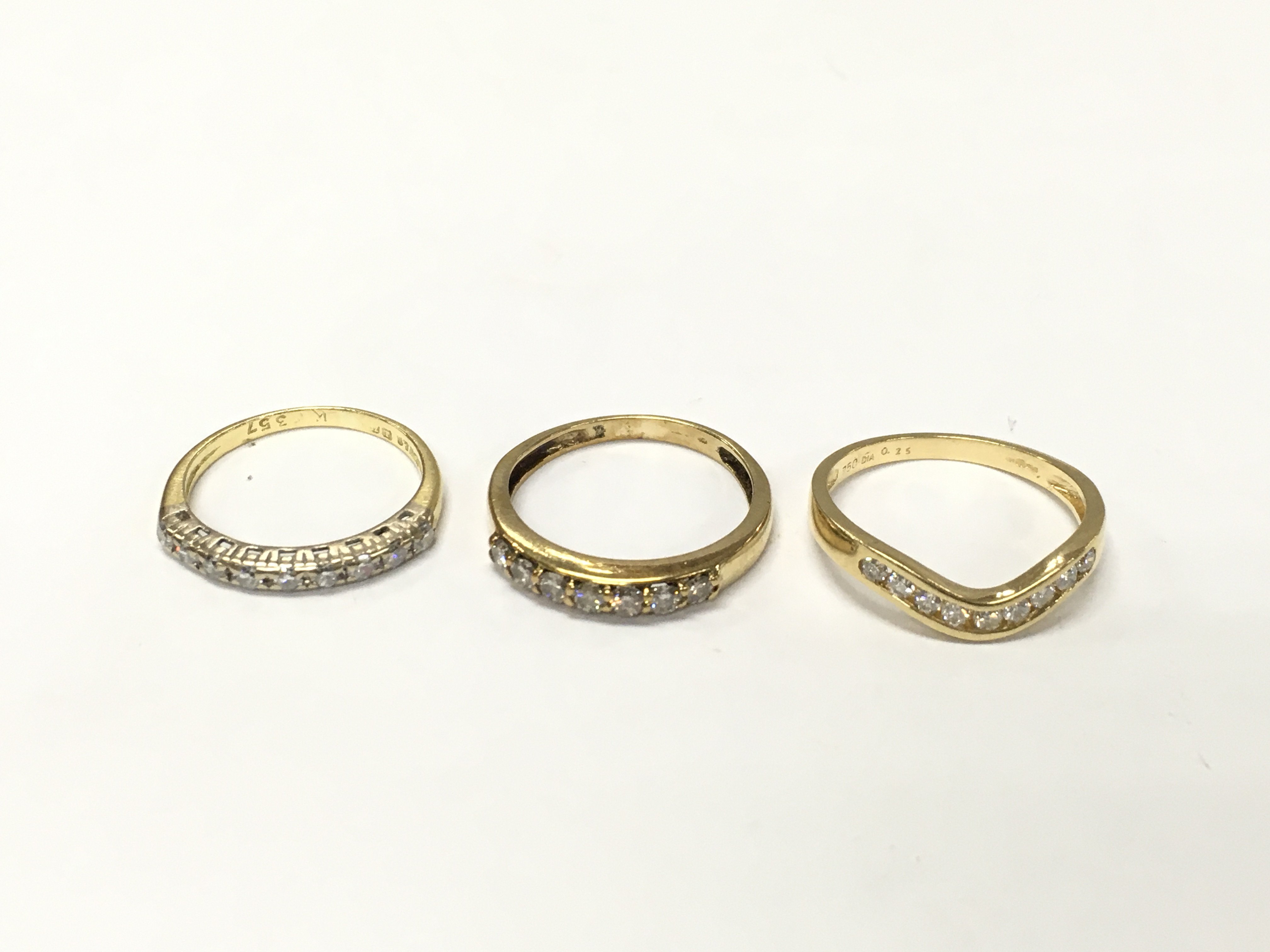 Three 18ct gold half hoop diamond rings. Sizes K L M 1/2 approximately 5.8g