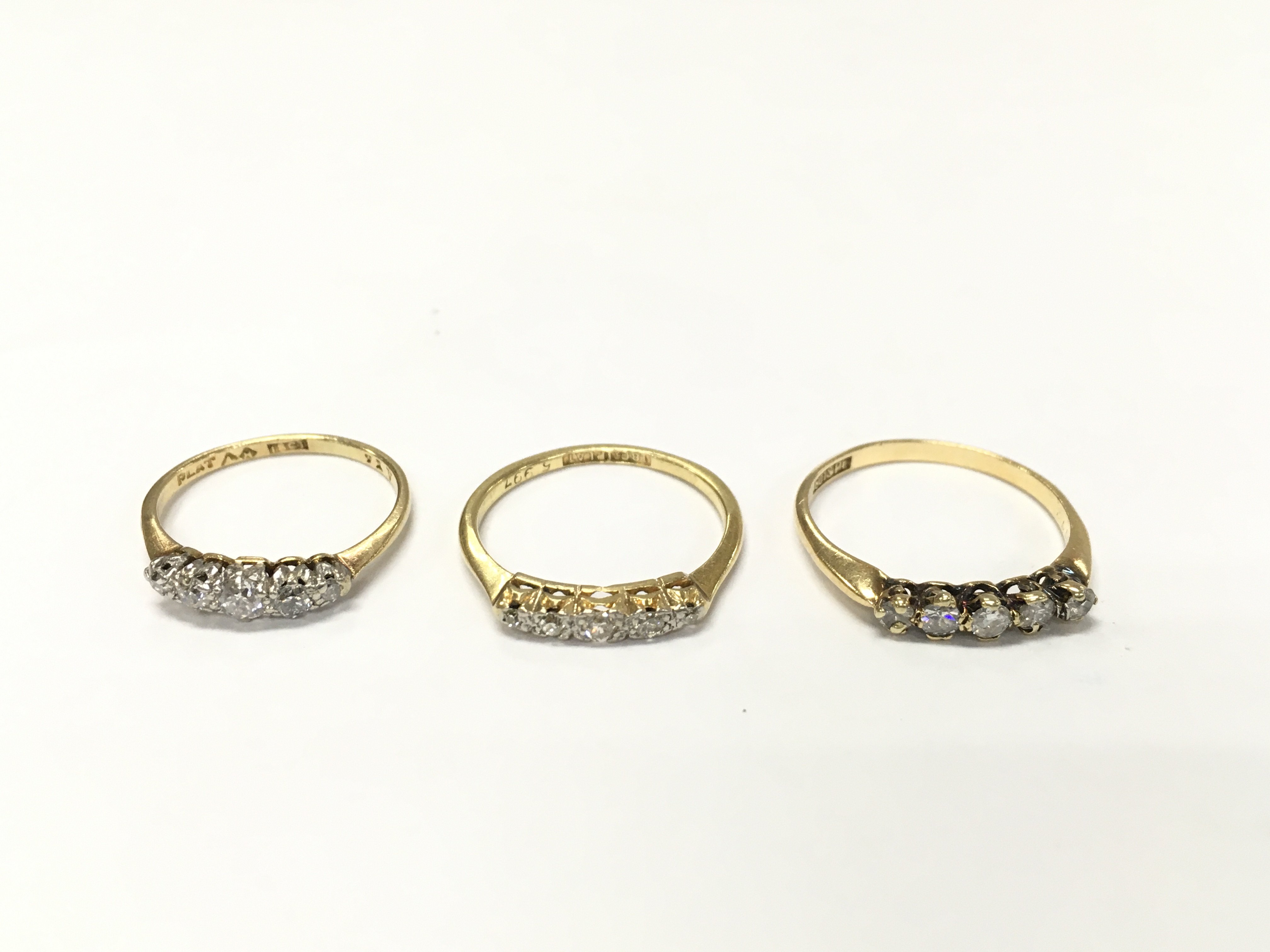Three 18ct gold five stone rings sizes K L1/2 M1/2 approximately 5.3g
