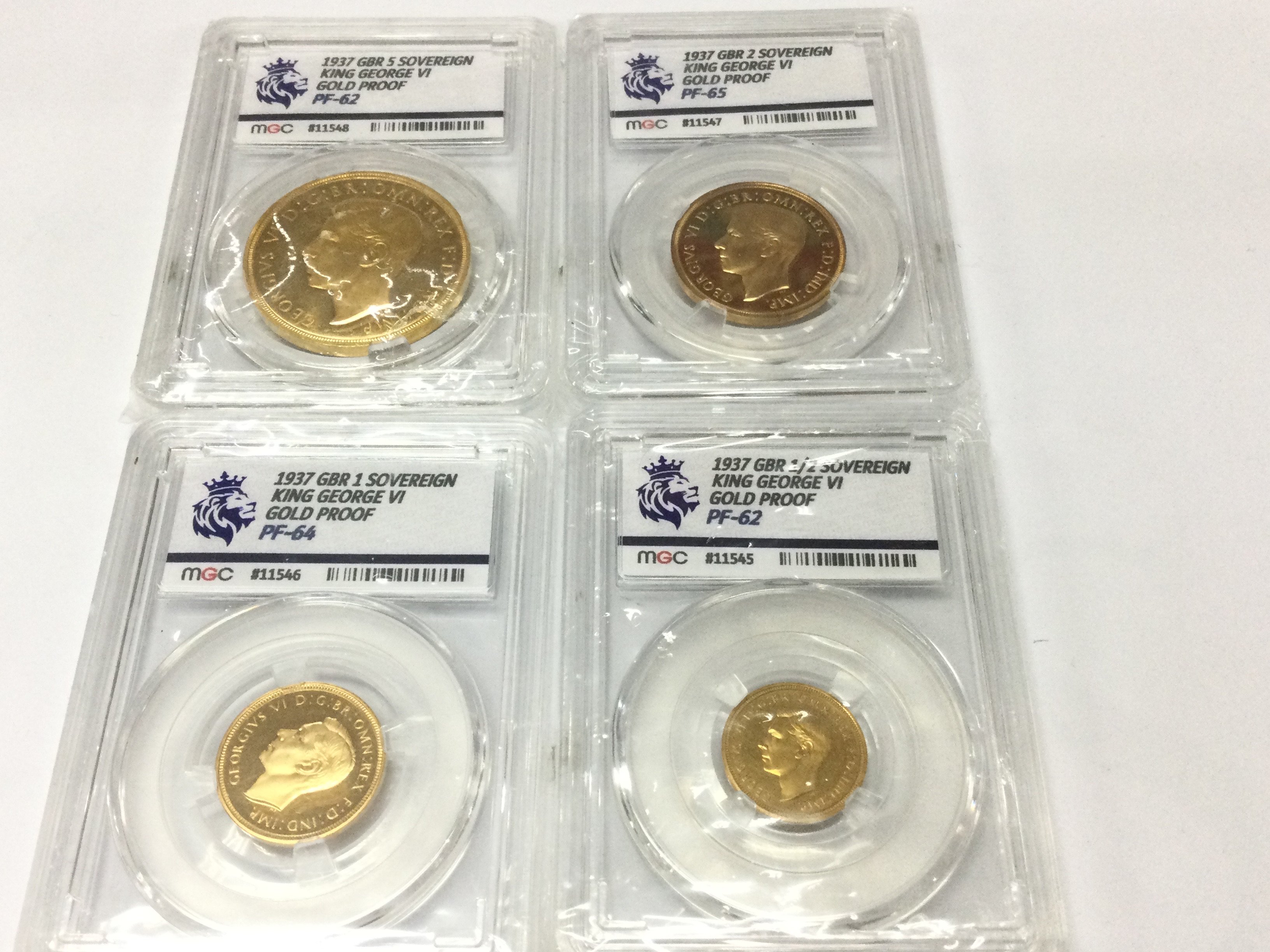 A graded set of 1937 gold proof sovereign including and 5 sovereign 2 sovereign 1 sovereign and 1/2 sovereign.