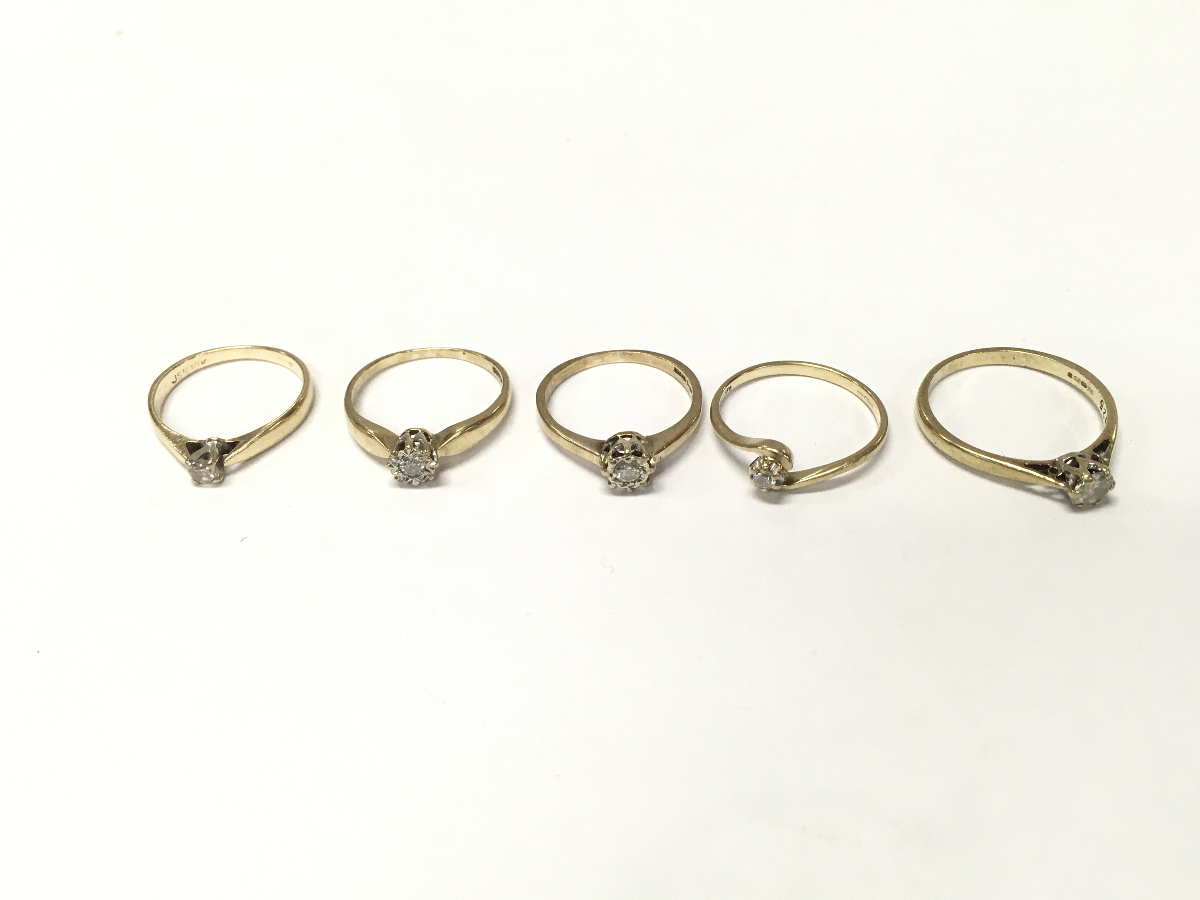 Five 9ct gold diamond solitaire rings. Sizes J J1/2 K M P approximately 7.3g