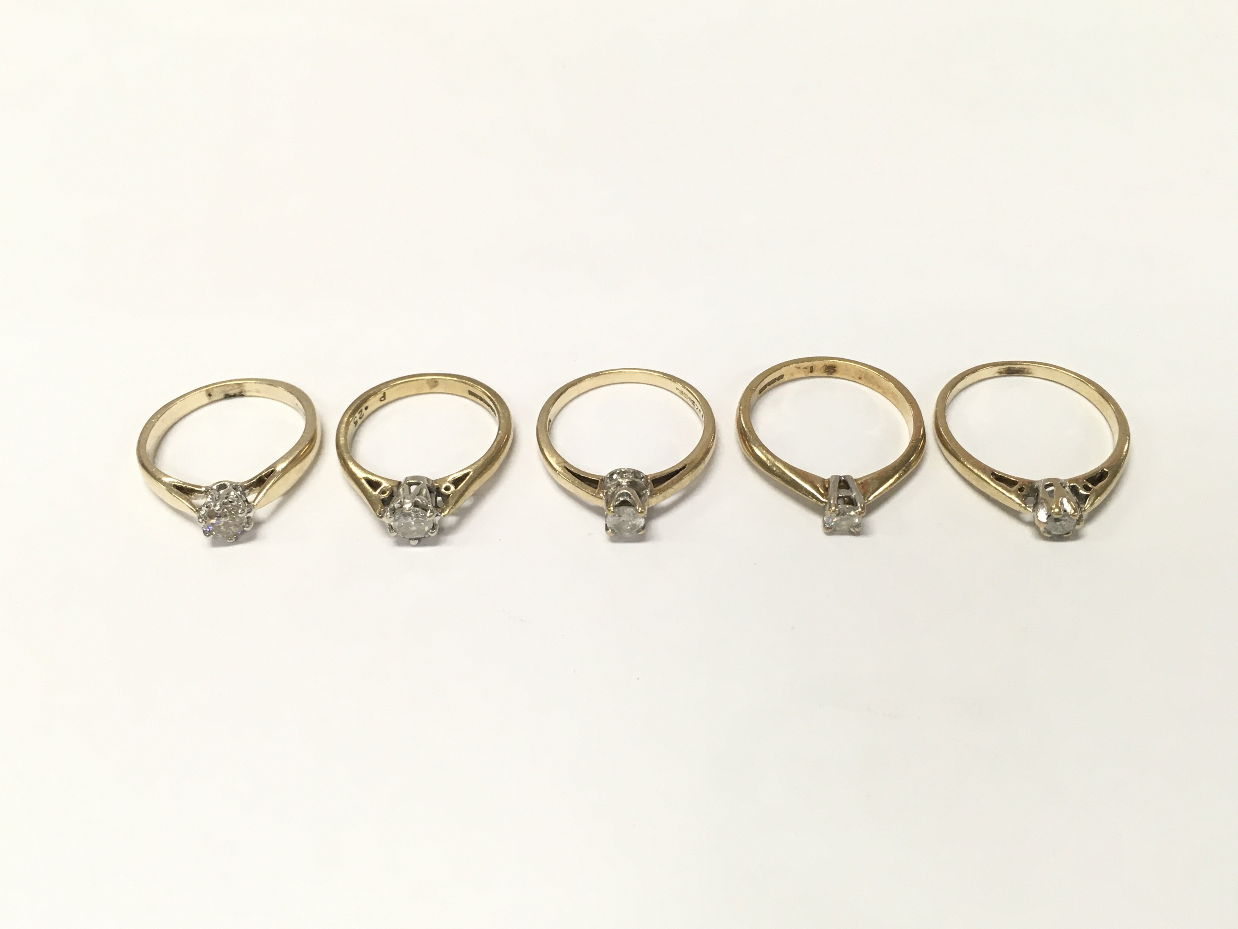 Five 9ct gold diamond solitaire rings. Sizes J L M N approximately 10.5g