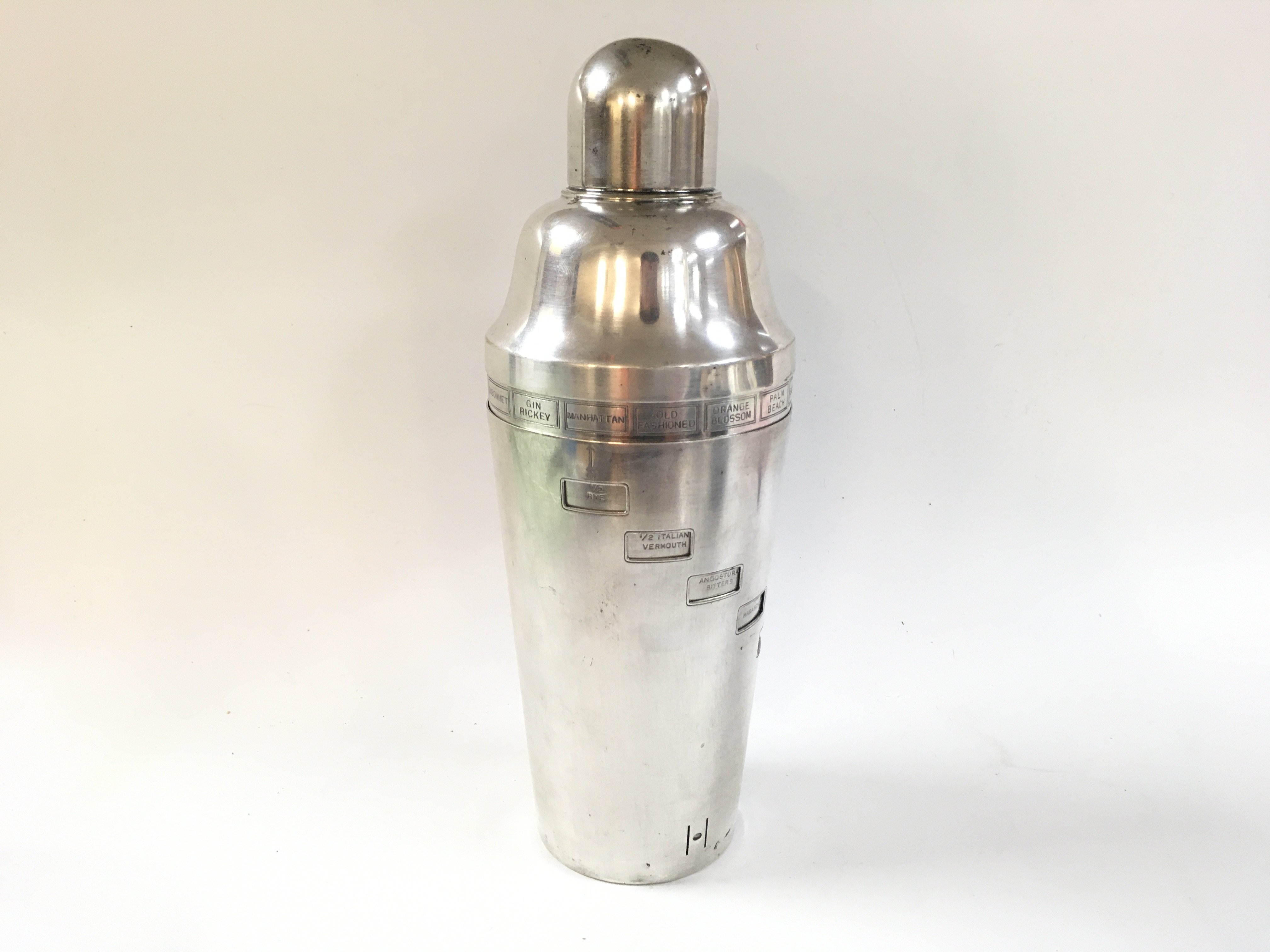 A 1930s asprey tell me how silver plated cocktail shaker.