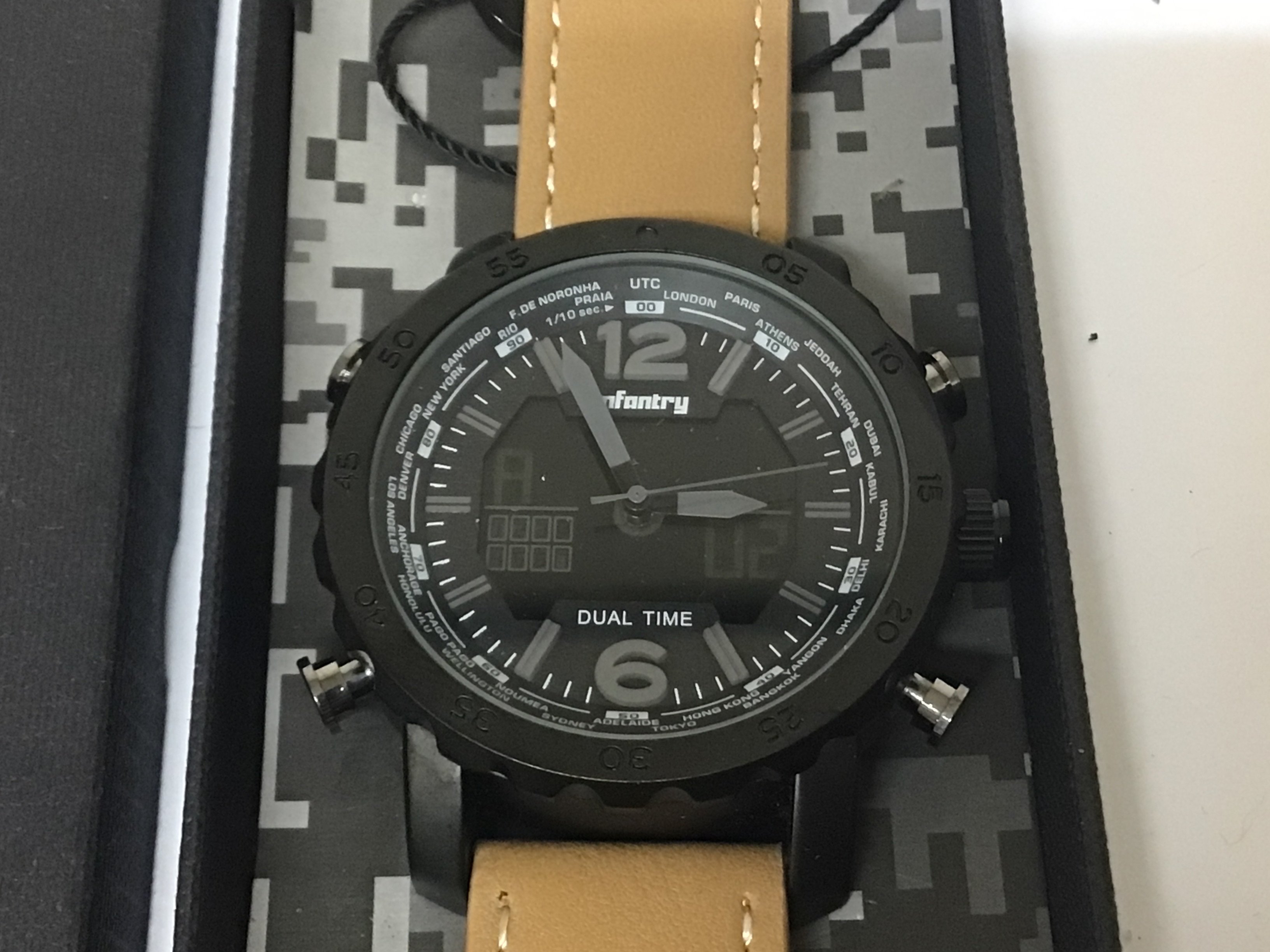 An Infantry Military style watch dual time Chronograph with digital display as new in a fitted box with warranty card may need a new battery.