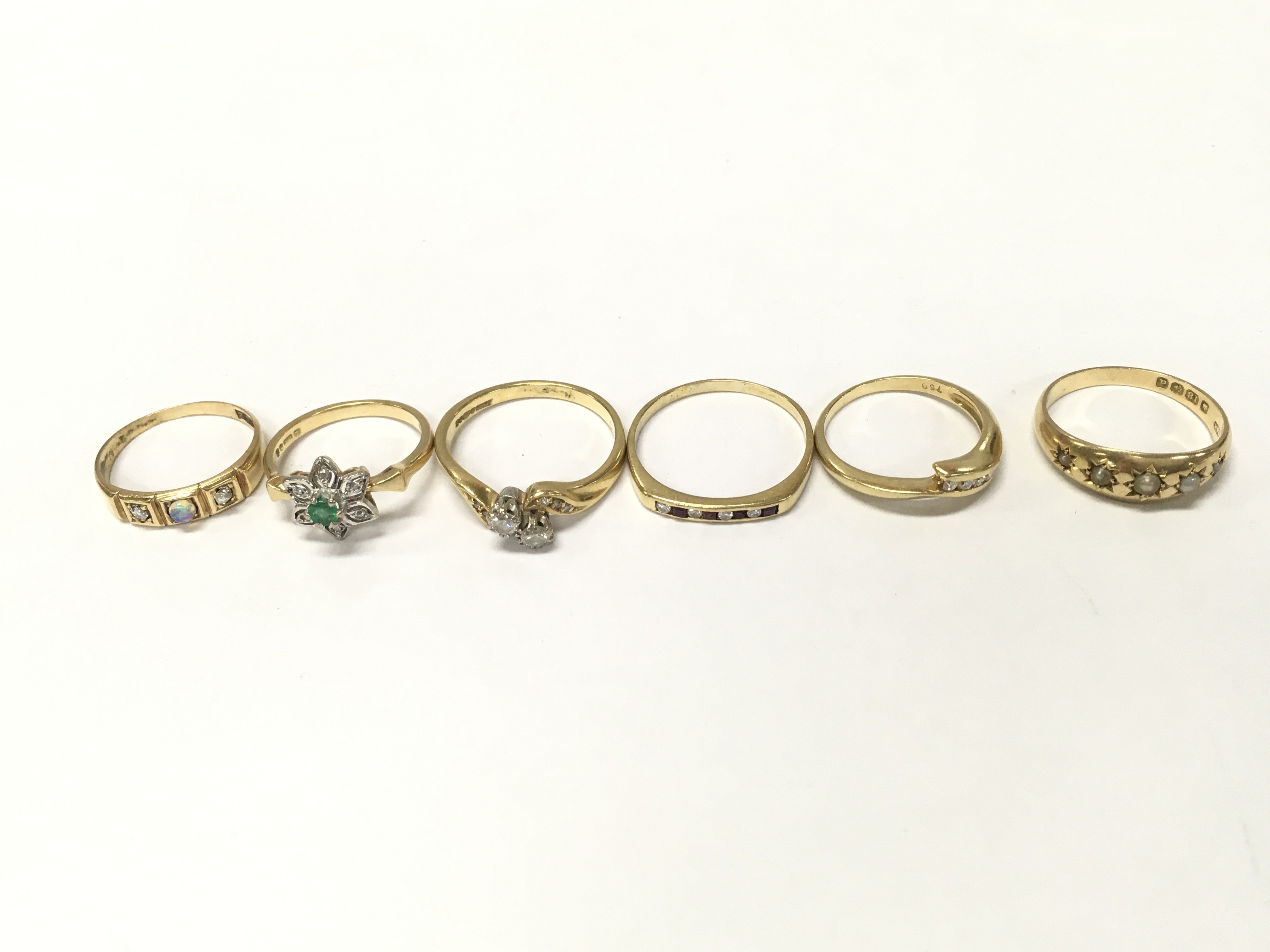 Six 18ct gold diamond and other stone rings. Sizes L L1/2 M R P approximately 18g