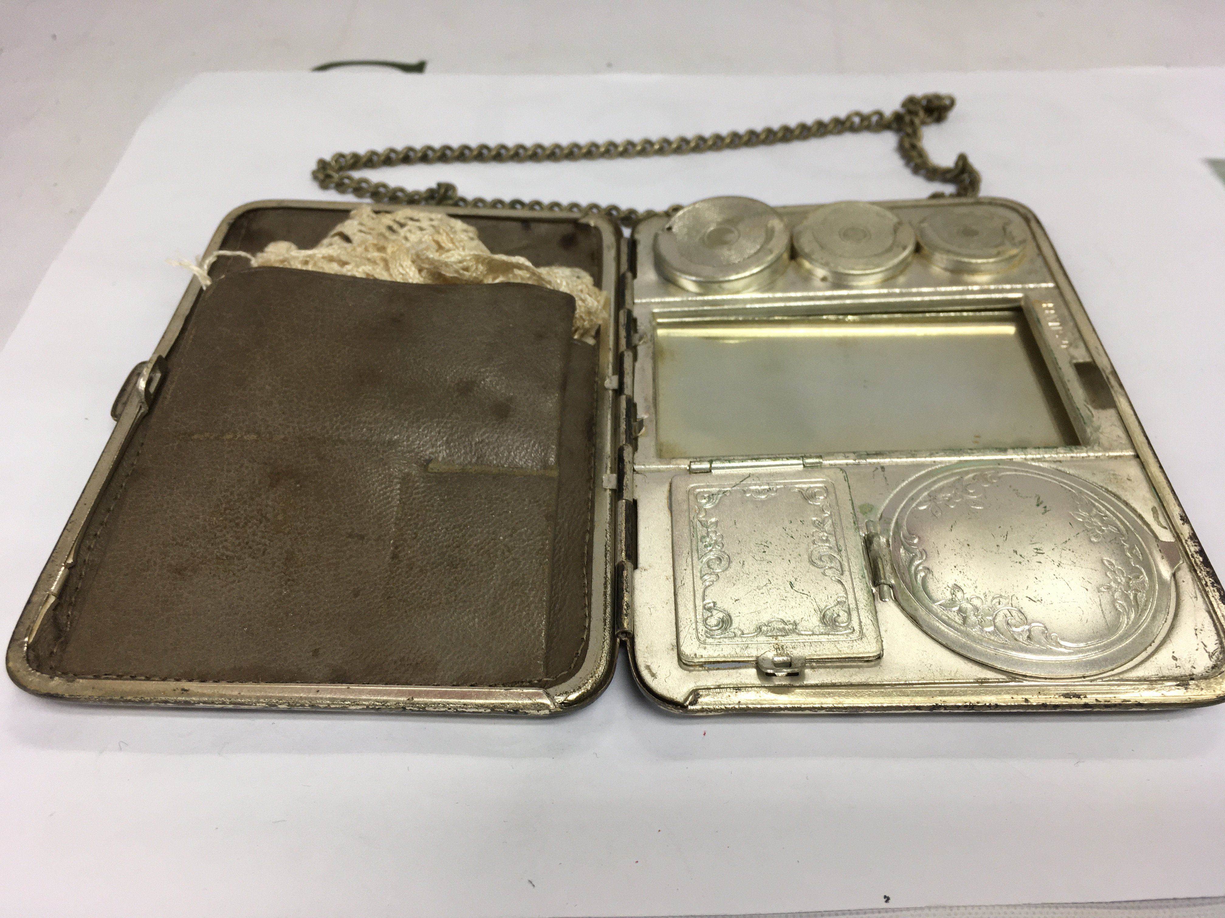 A vintage purse with fittings for a compact, coins etc. Shipping category A.