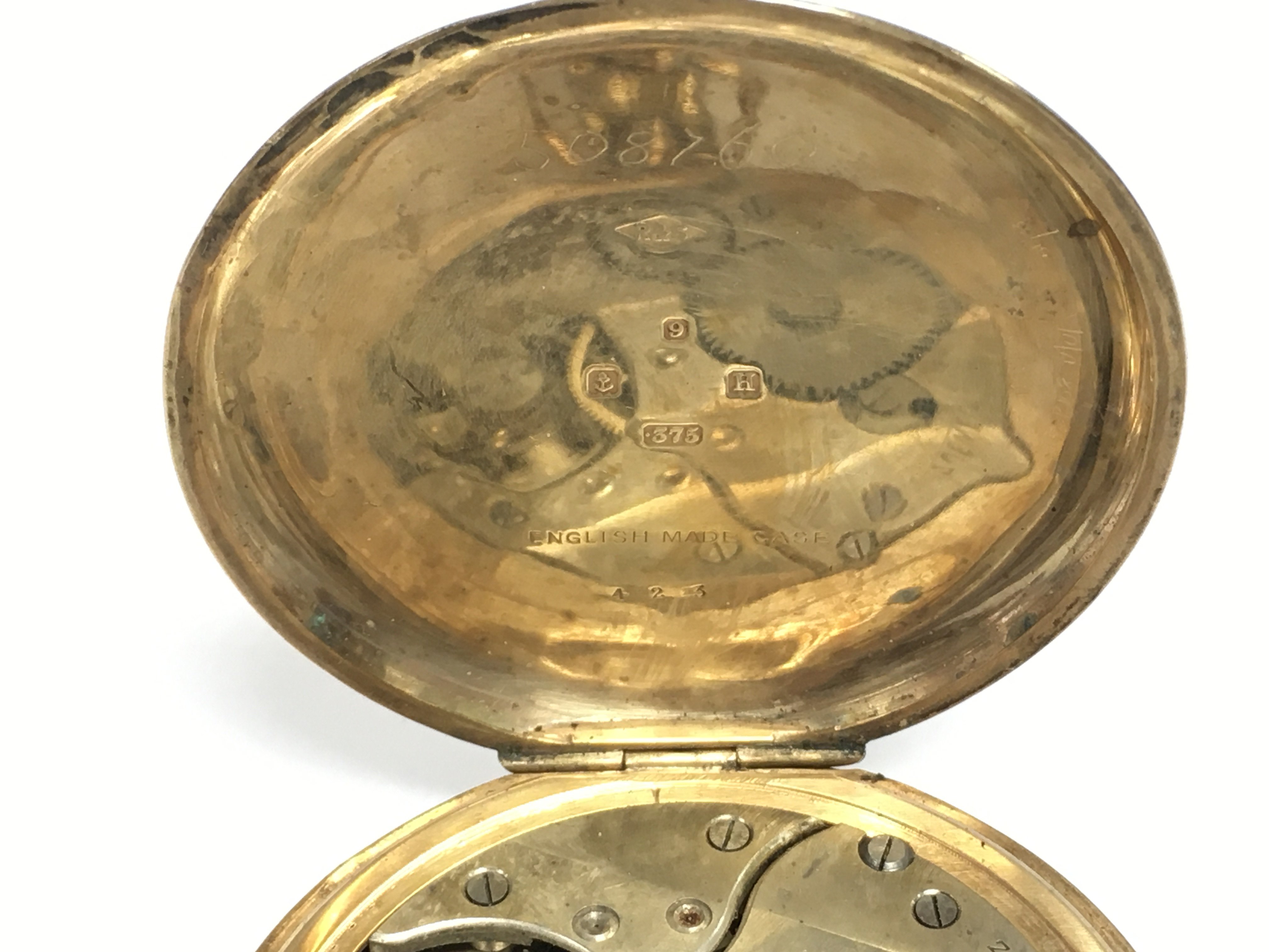 A 9ct gold pocket watch. Winds and runs. 64.04g