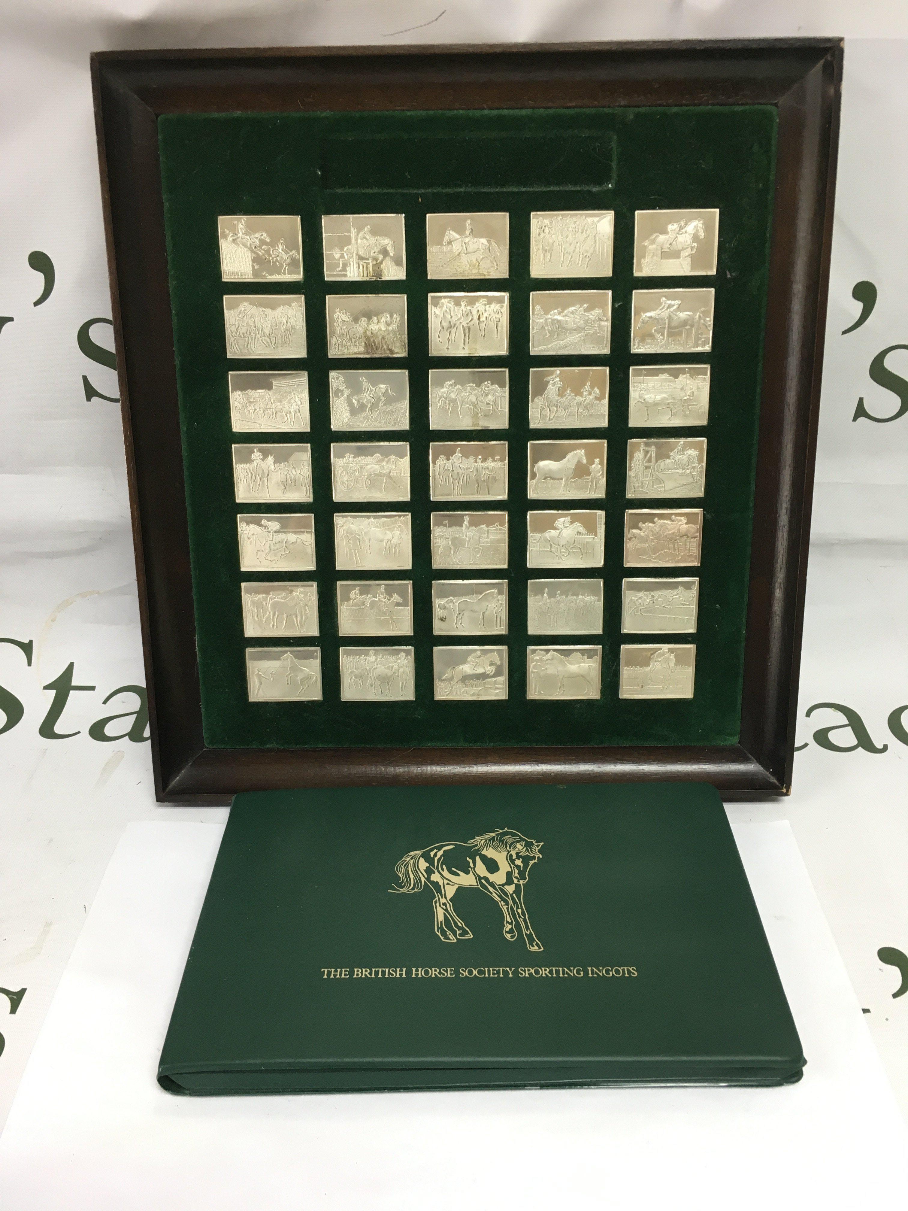 A John Pinches sterling silver sporting ingots set for The British Horse Society. Shipping category B.