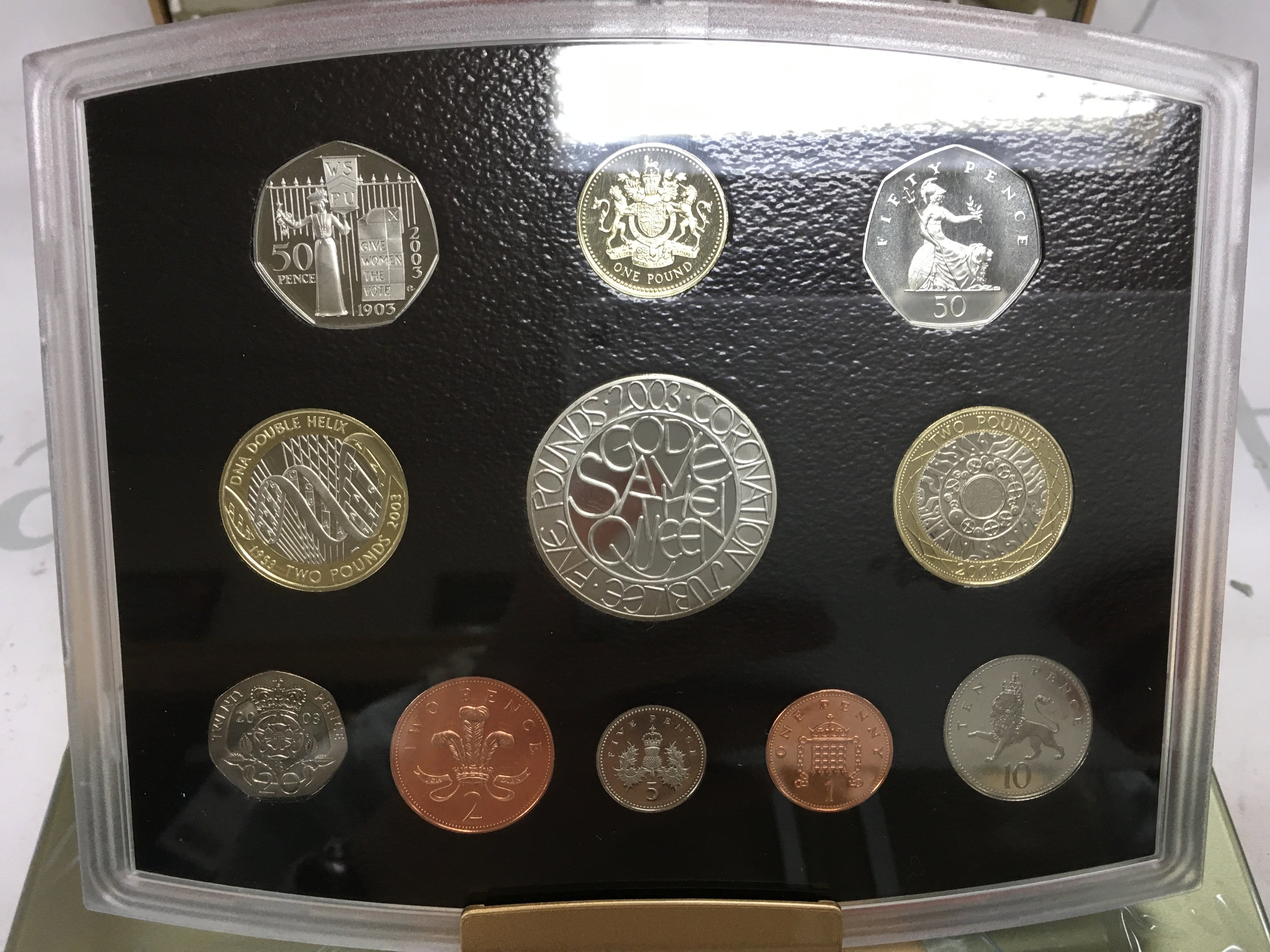 A royal mint golden jubilee proof coin set.