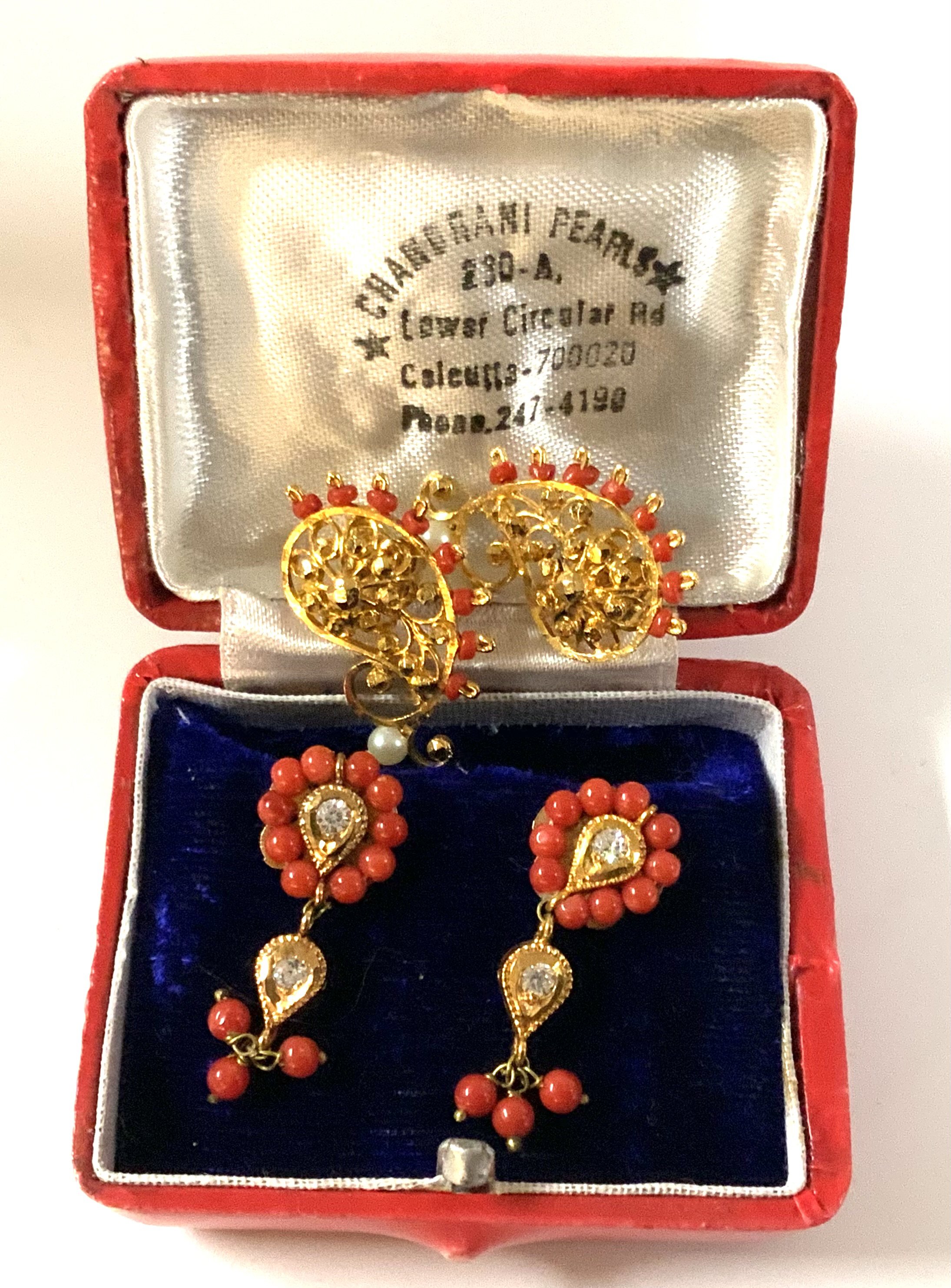 2 pair of vintage gilt stone set Mughal Indian stud earrings.