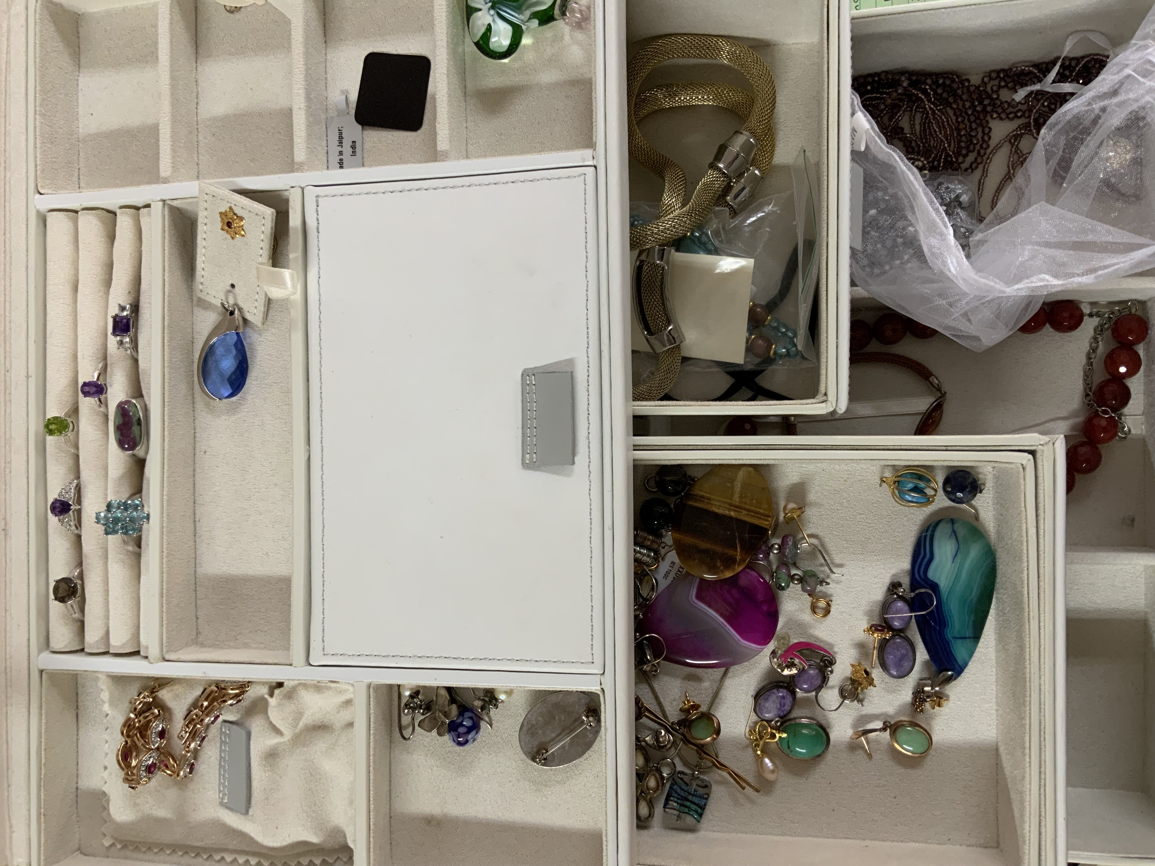 A large jewellery box and jewellery contents.