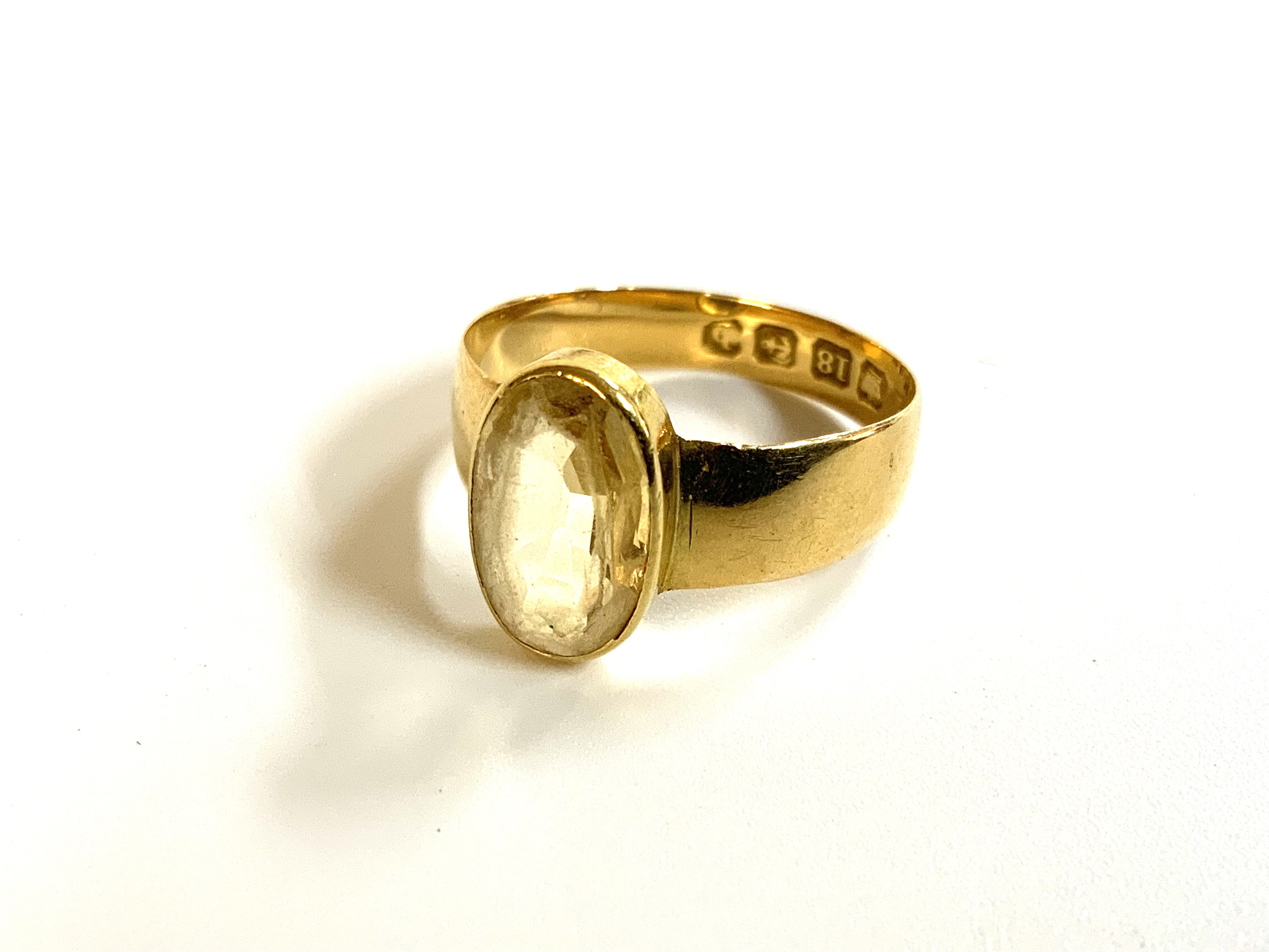 An antique oval cut citrine ring with 18ct gold ring mount. Size M. (A)