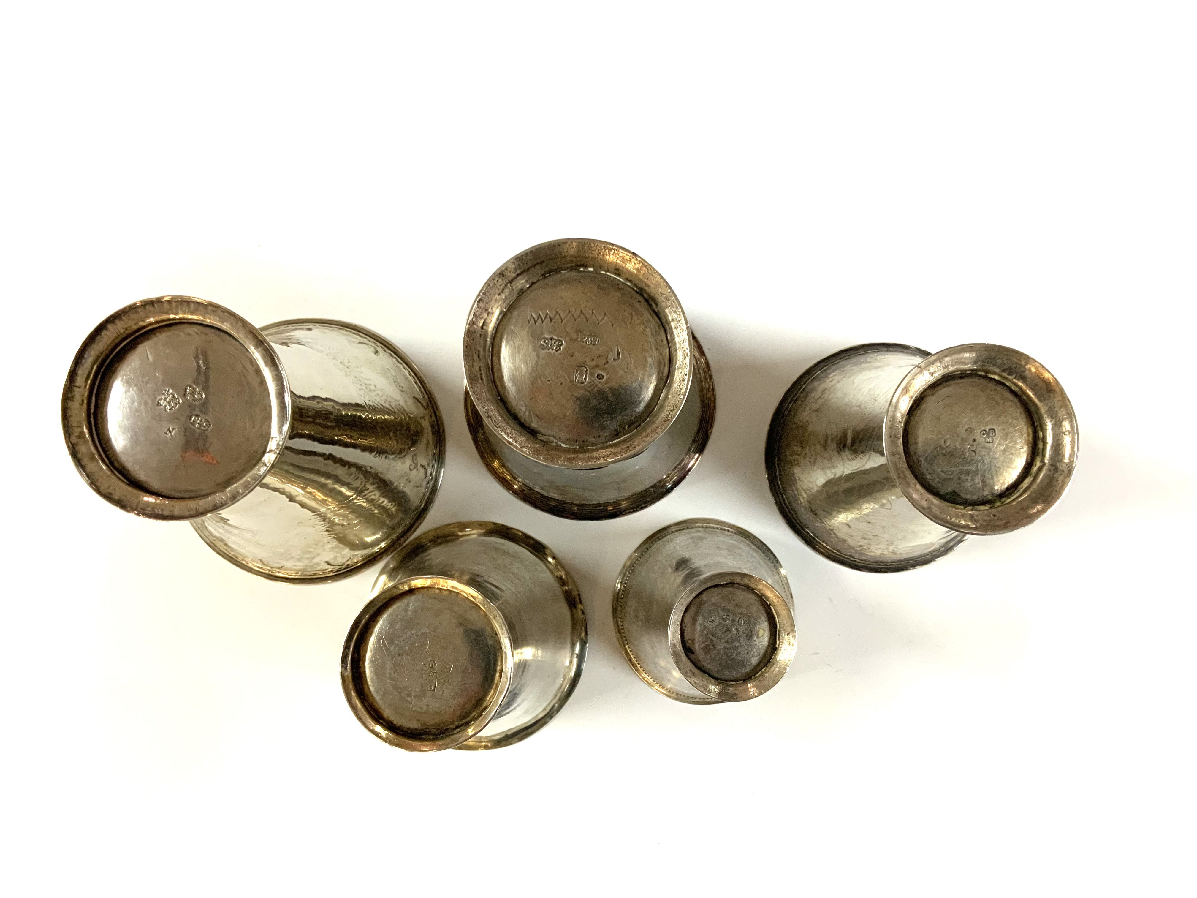 5 various size 18th / 19th Century Swedish silver beakers. Sizes 7cm - 10.5cm.