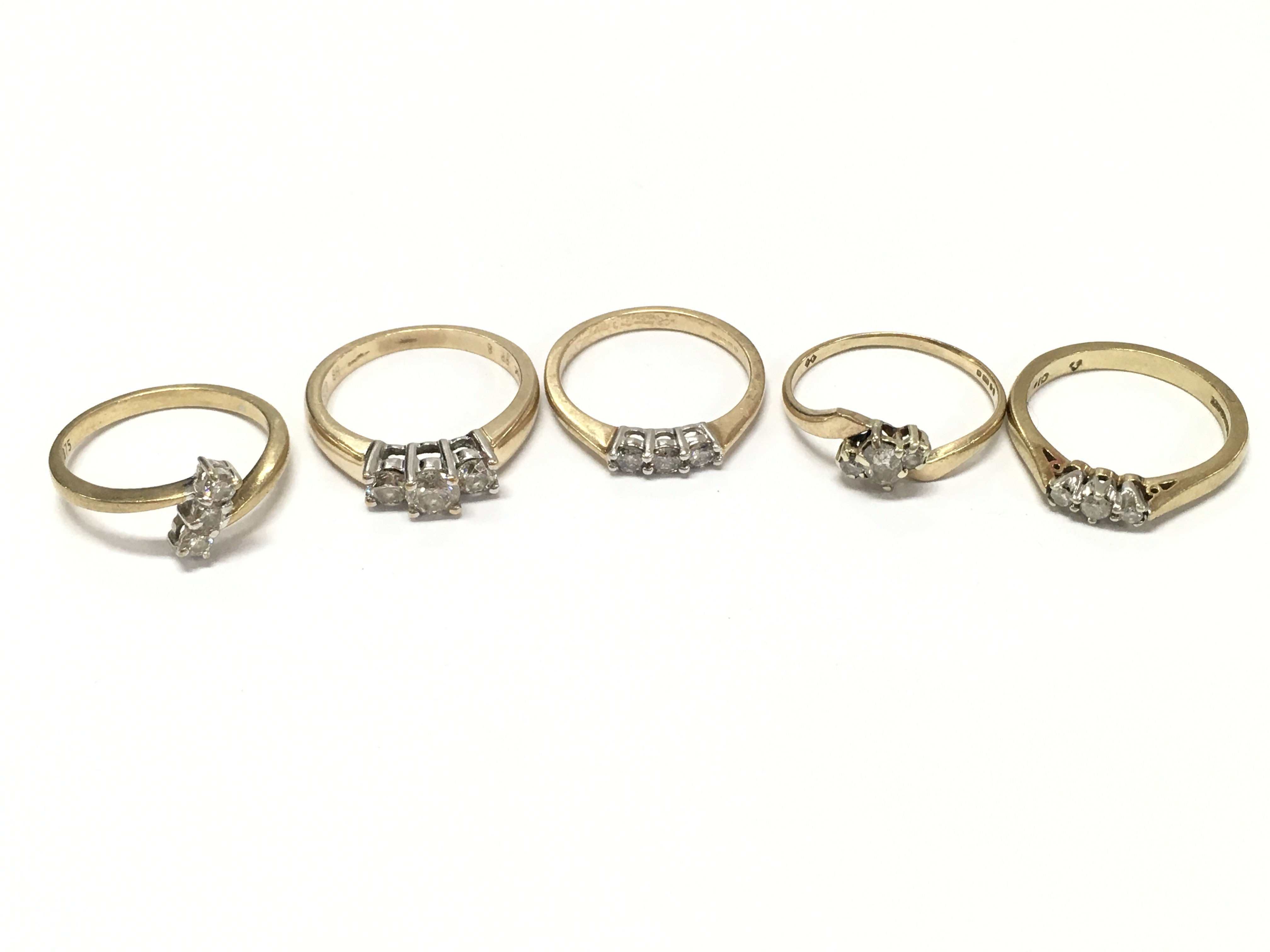 9ct gold rings set with diamond and Moissanite stones . Sizes around M. 10.5g total weight. postage category A