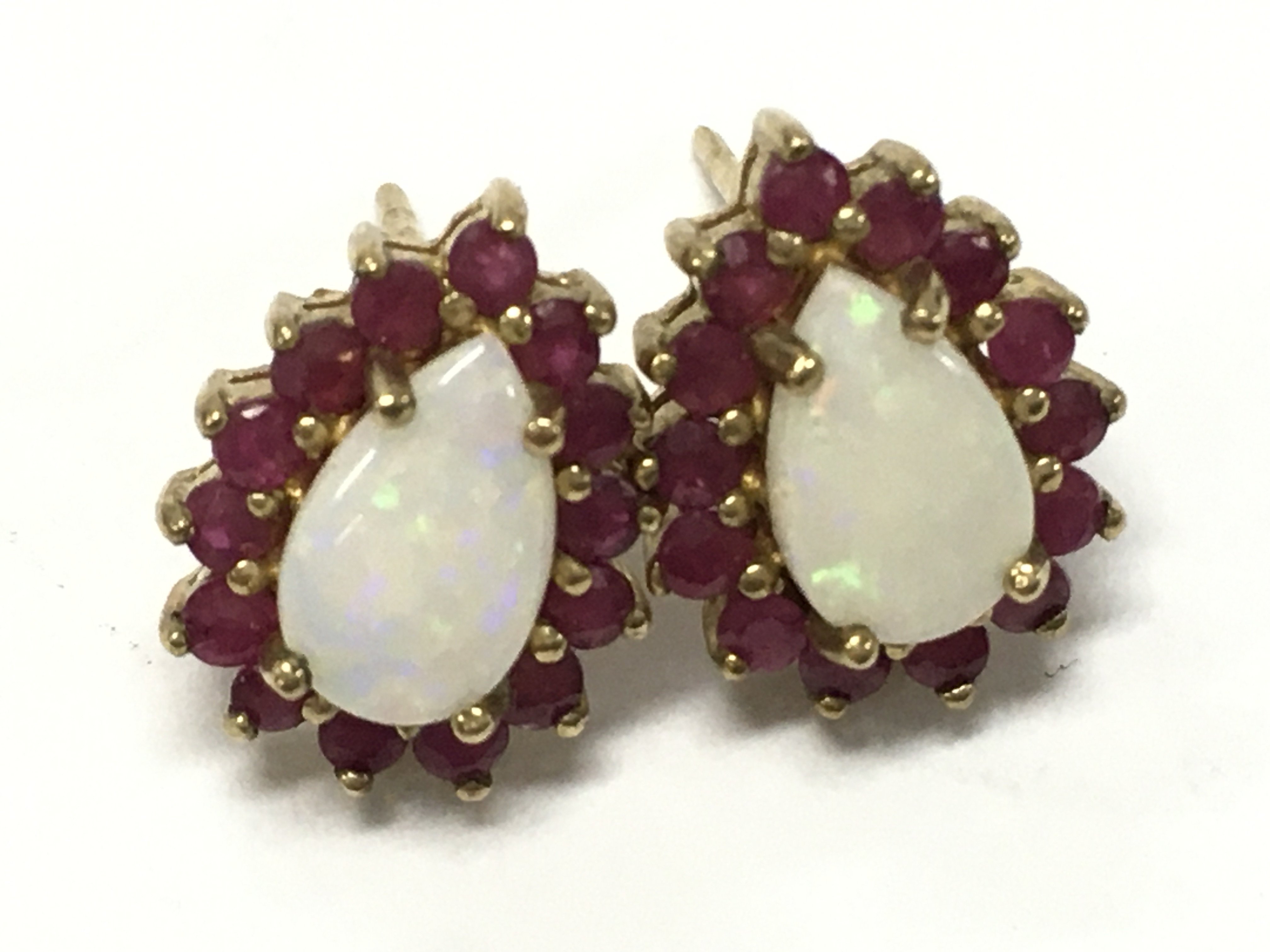 9 carat Gold ruby and Opal set earrings , no butterflies . 1.9g total weight, Postage category A