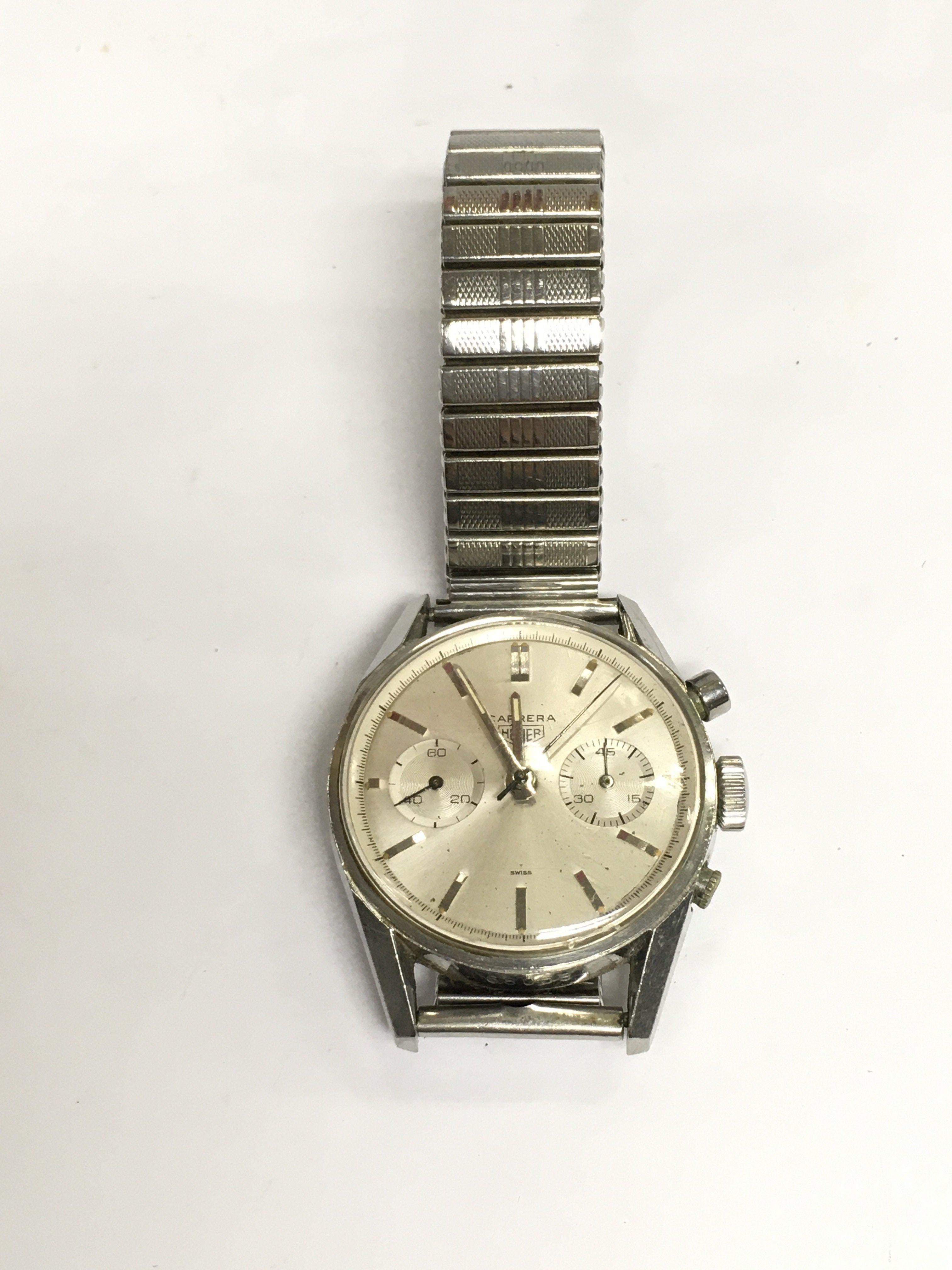 A steel cased Tag Heuer Carrera watch. Shipping category A.
