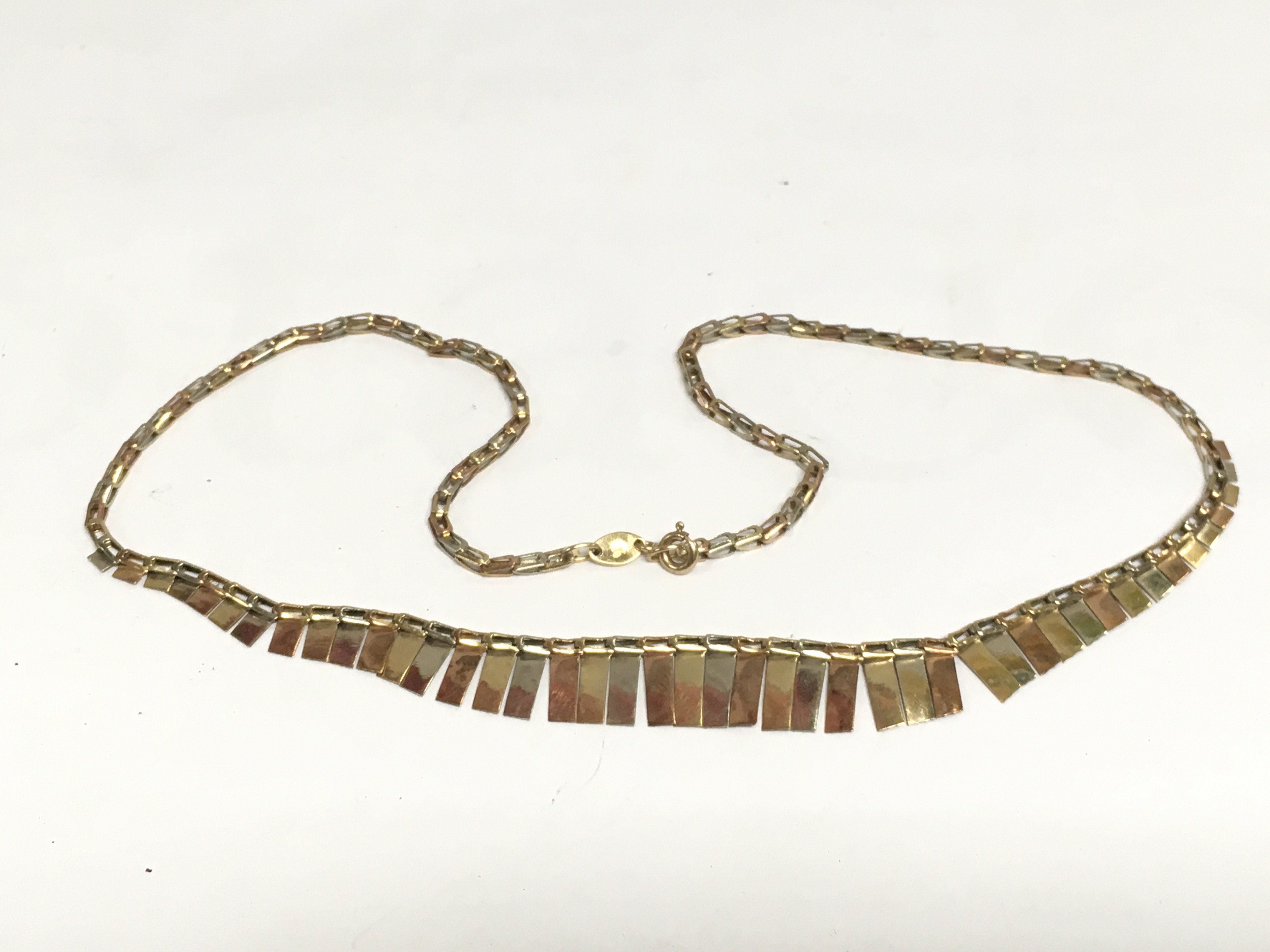 A 9ct gold three tone necklace, approx 7.3g. Shipping category A.