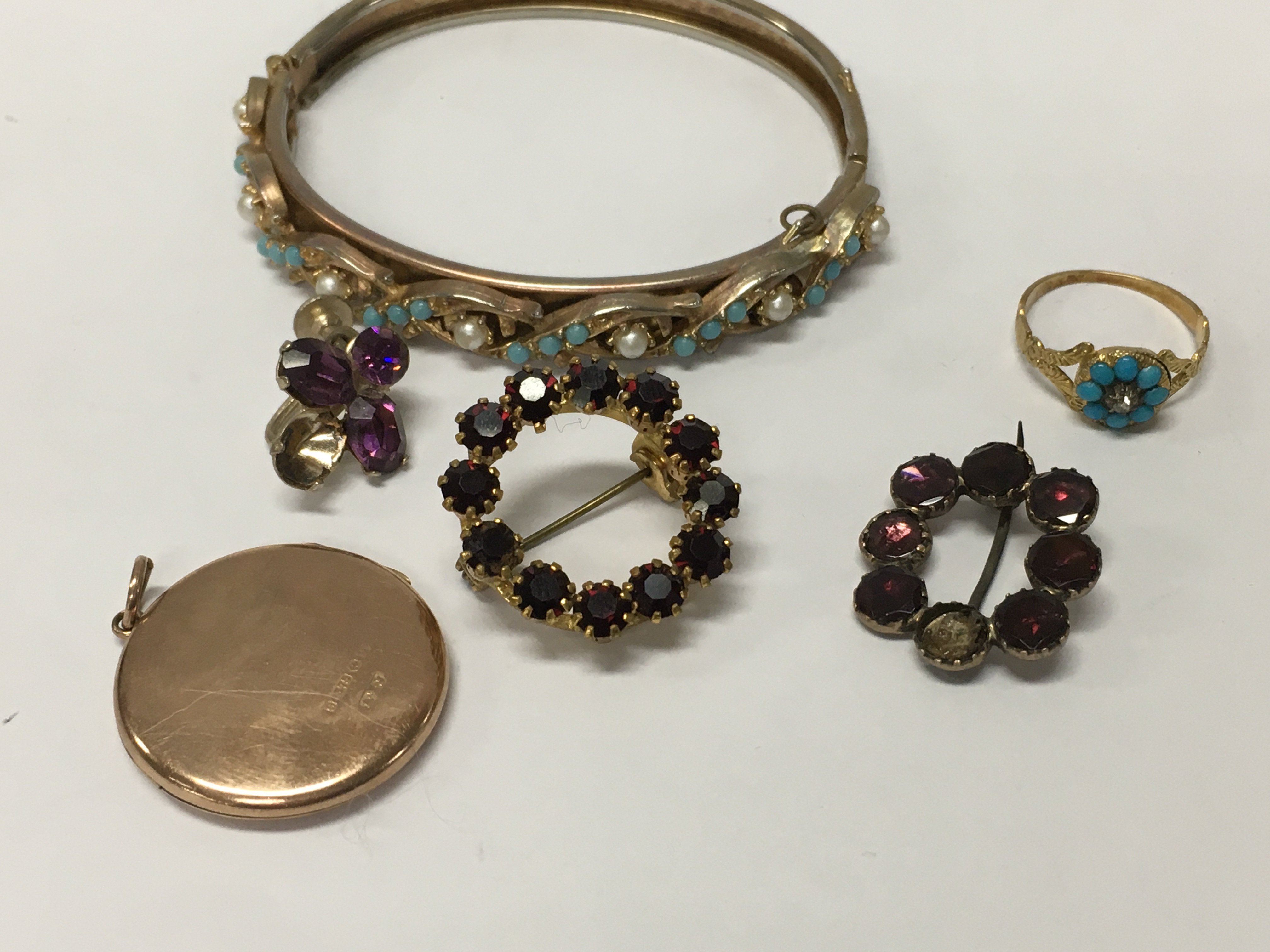 A collection of Edwardian jewellery including a bangle together with a 9 ct gold pendant 4 grams.