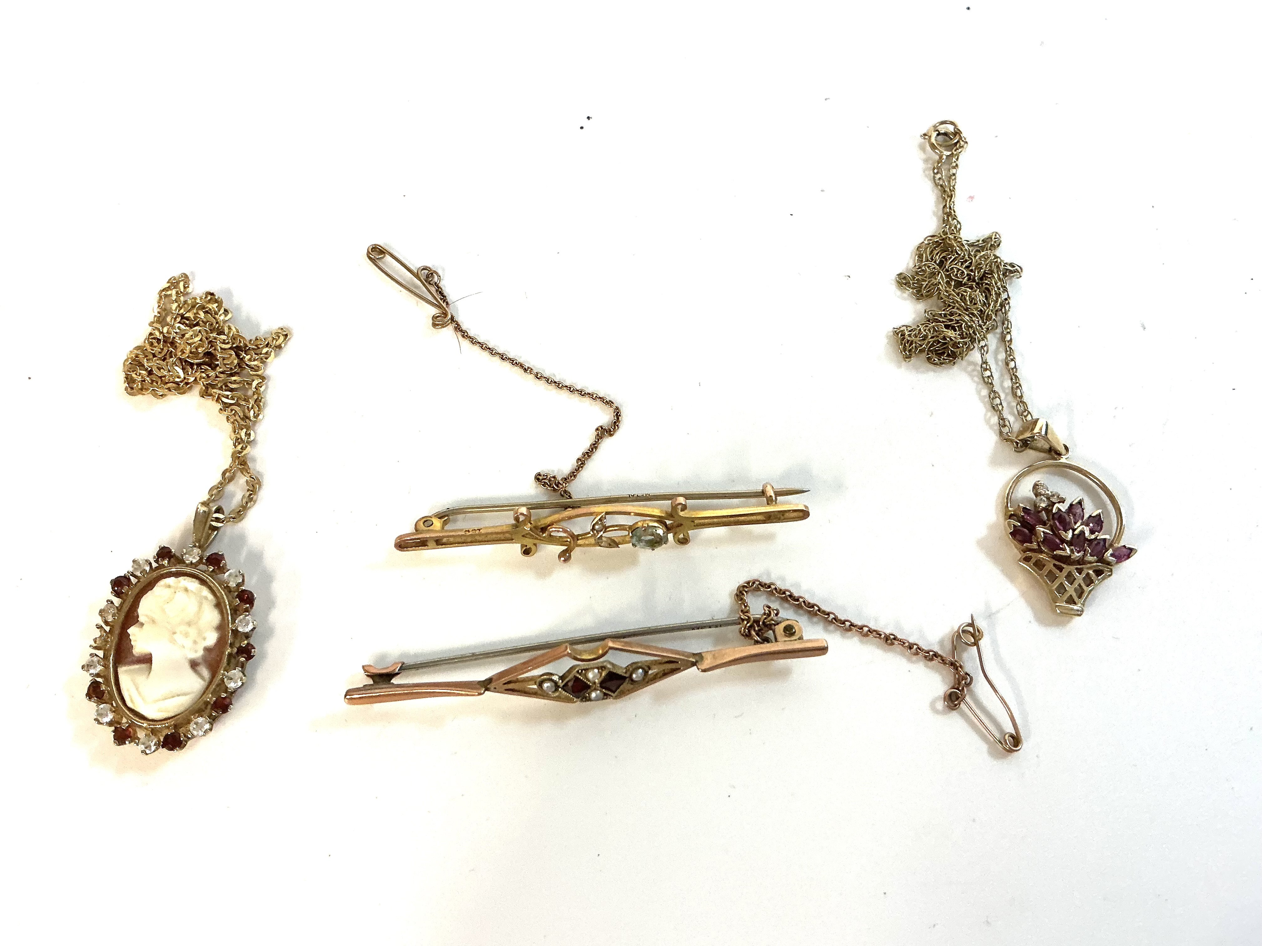 2 vintage pendant and chains together with 2 vintage gold bar brooches.