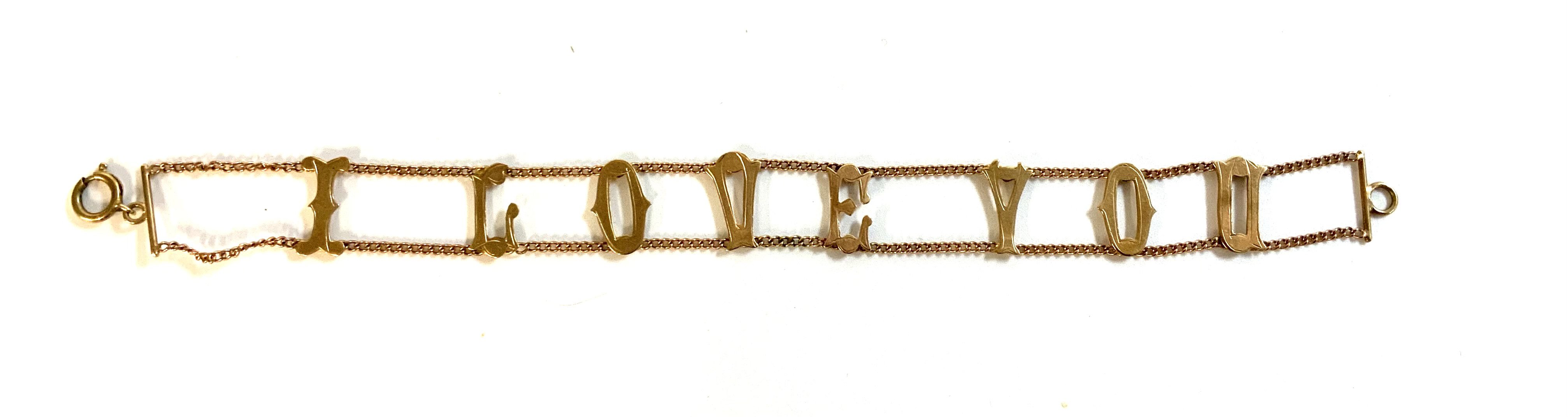 a vintage 9ct gold I LOVE YOU bracelet. (A)