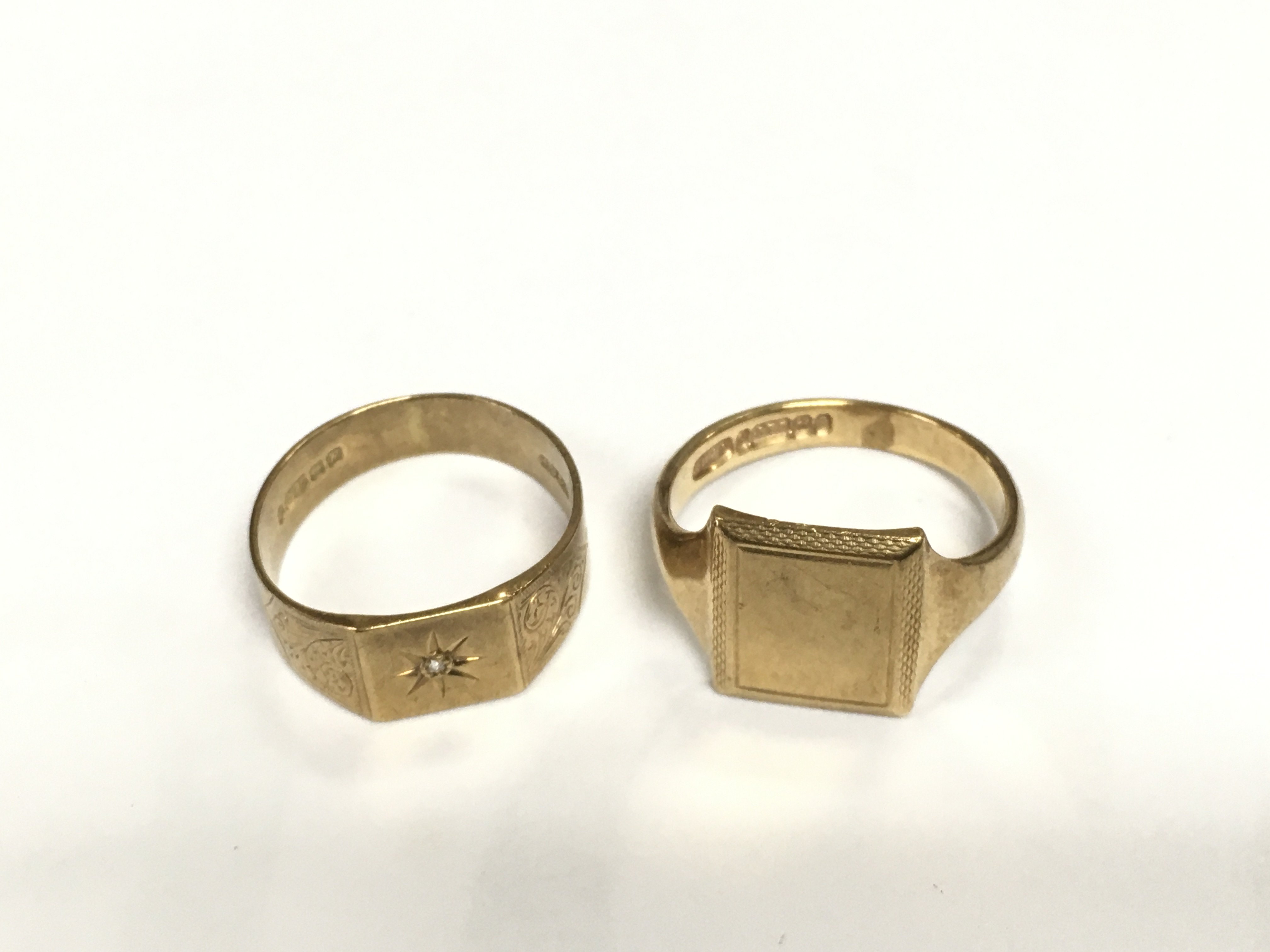 Two gents 9ct gold rings, one set with a chip diamond, approx total weight 8.2g and approx size P-Q and R. Shipping category A.