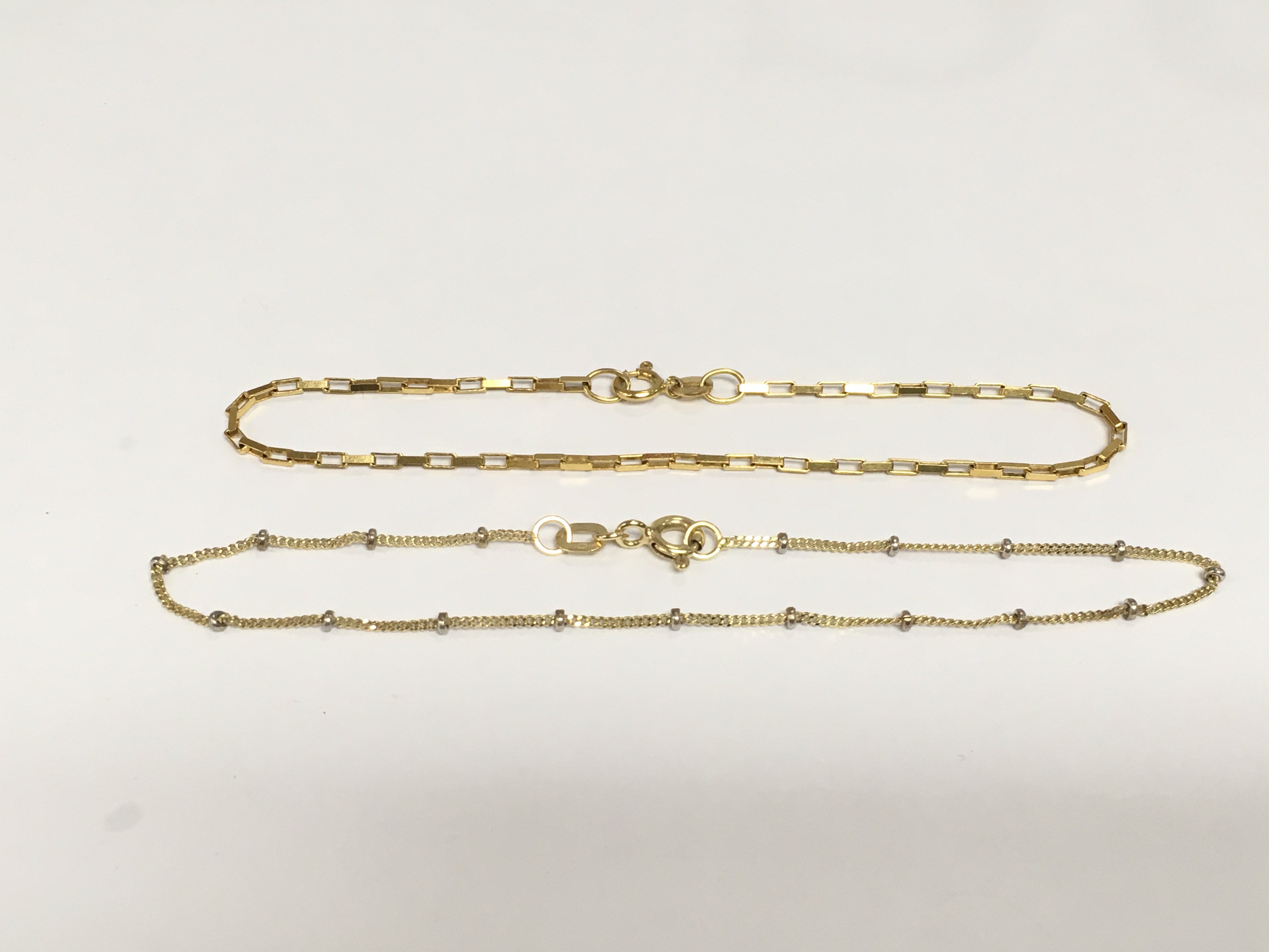 Two 9ct gold bracelets, approx total weight 2.2g. Shipping category A.